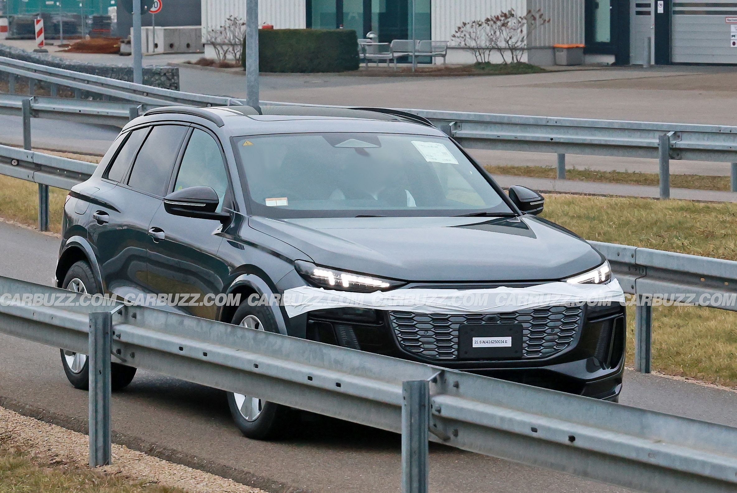 Audi Q6 E Tron Drops 99 Of Camouflage Spied Nearly Naked