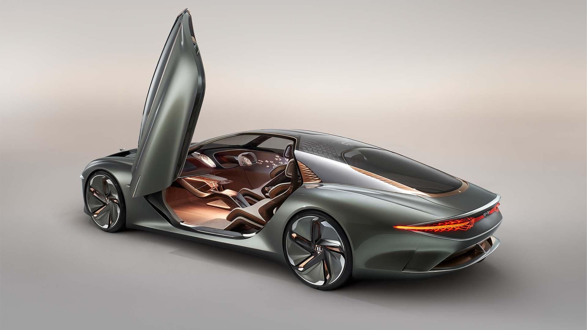 Bentley EXP 100 GT Concept with one scissor door opening toward the sky, showing some of the cabin.