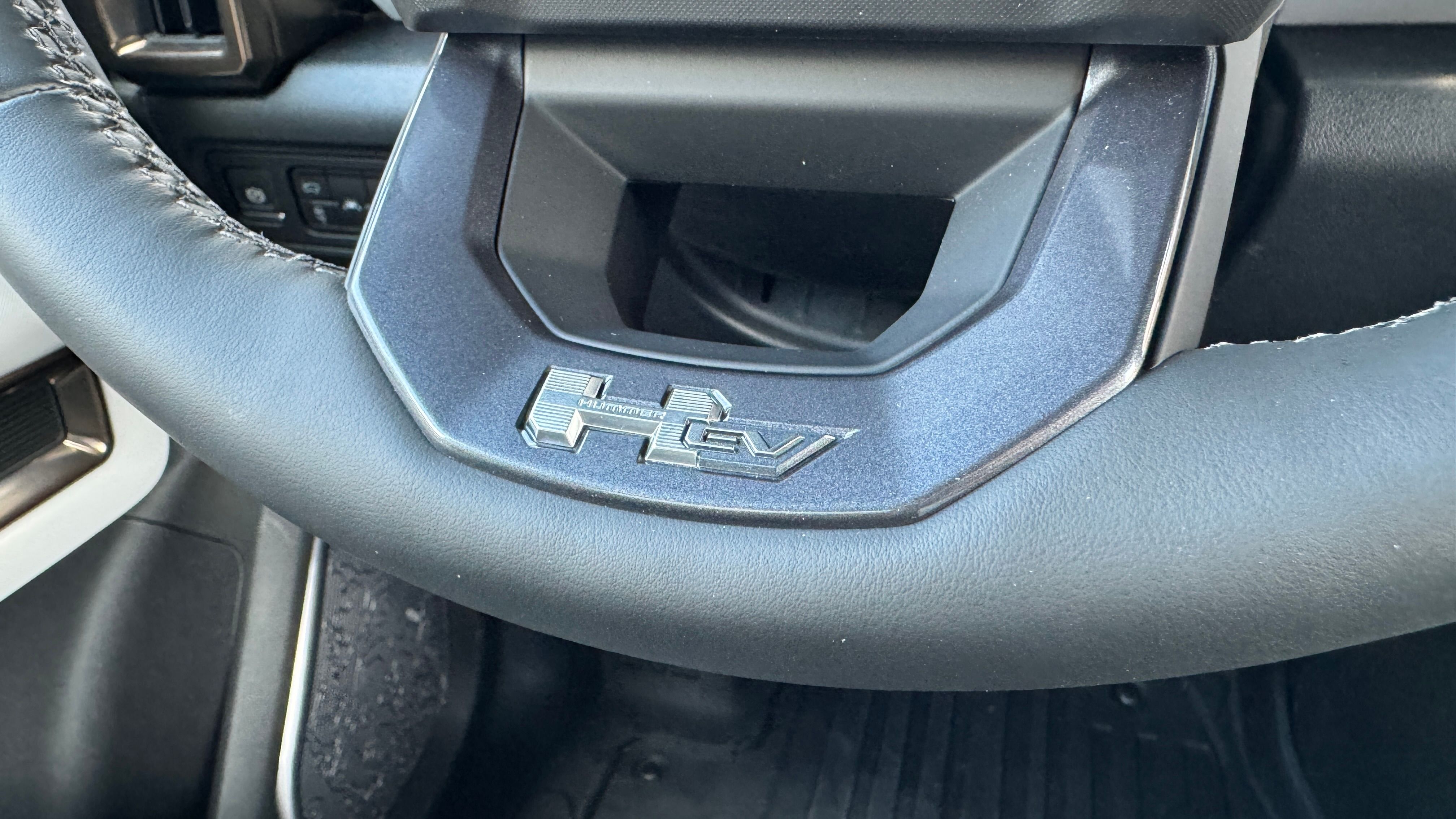 2024 GMC Hummer EV SUV steering wheel badge