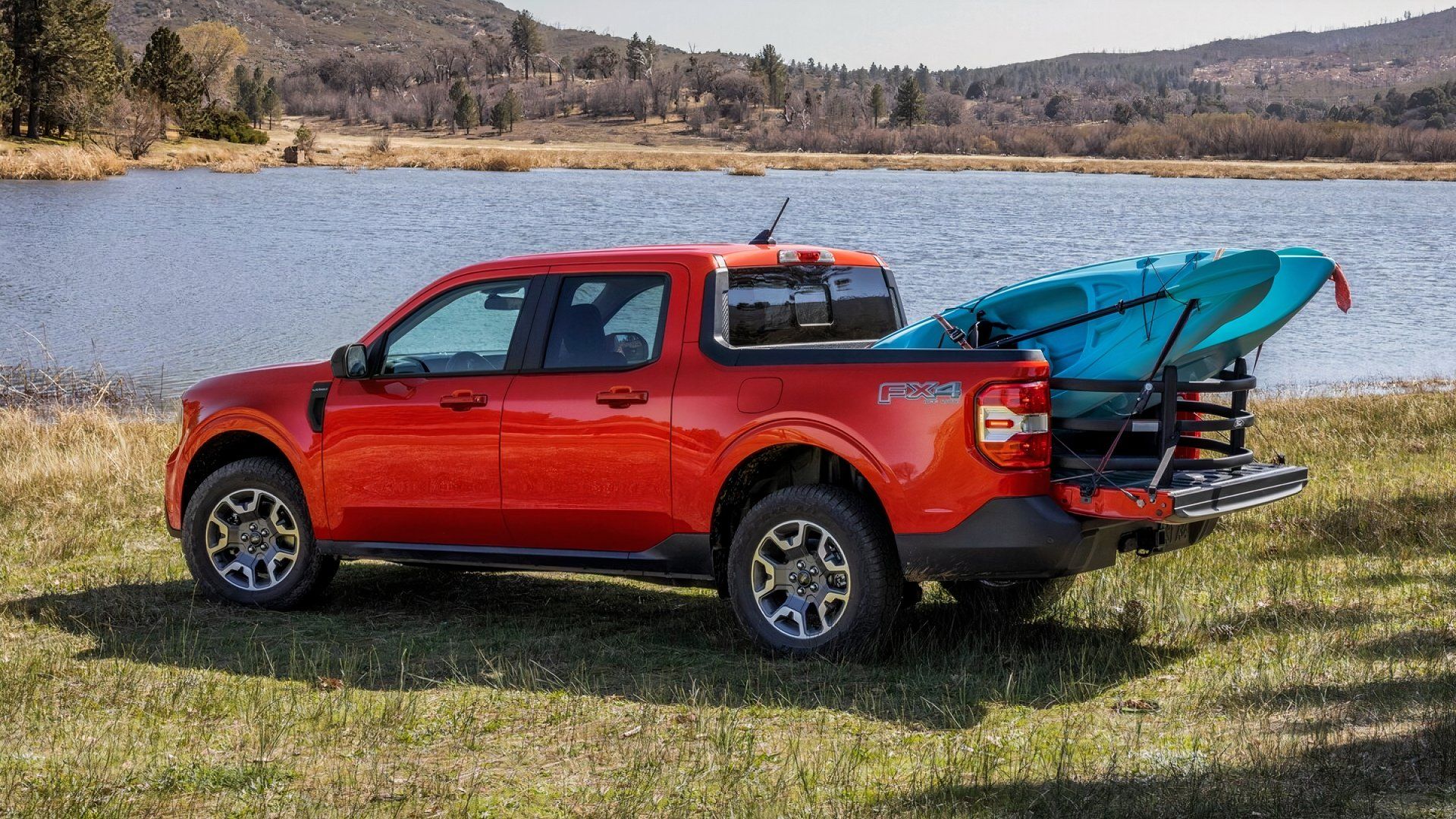 2024 Ford Maverick, rear quarter view, red, kayak in bed