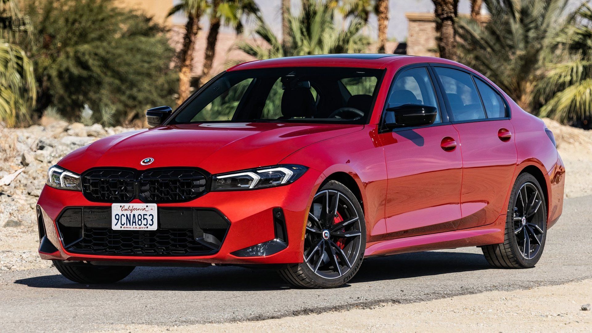 BMW M340i, front quarter view, red