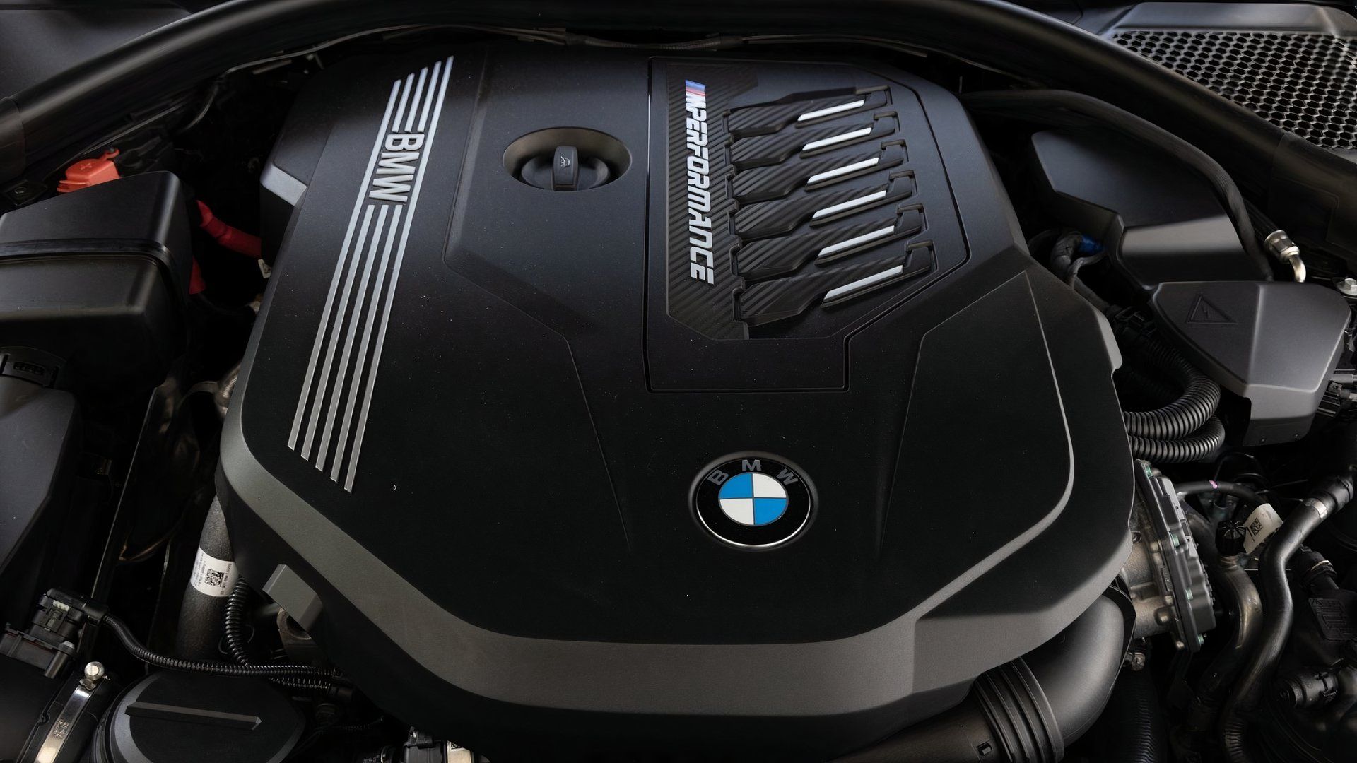 BMW B58 engine (M240i), view of engine in bay, closeup