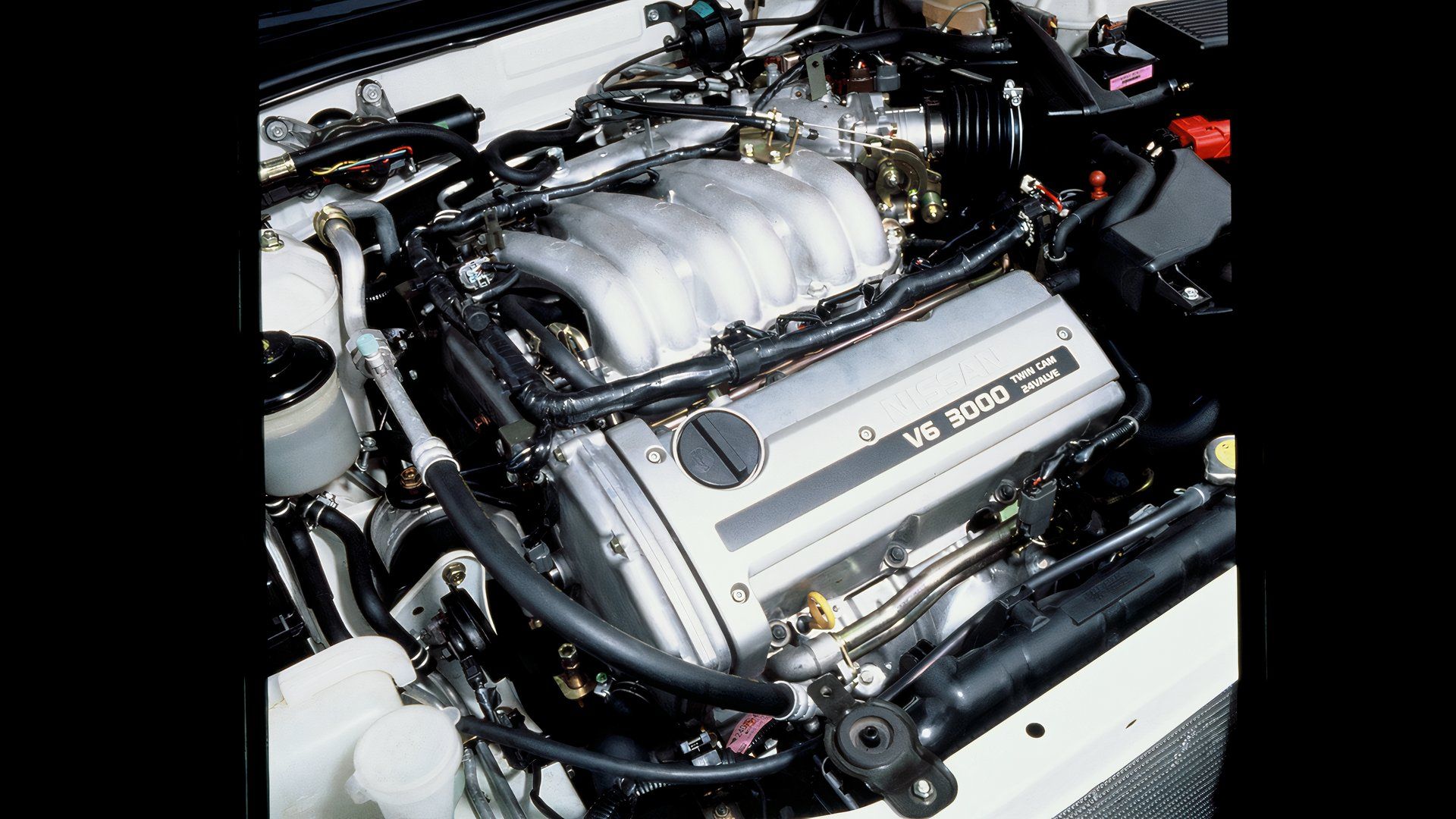 1995 Nissan Maxima engine, closeup of engine in bay