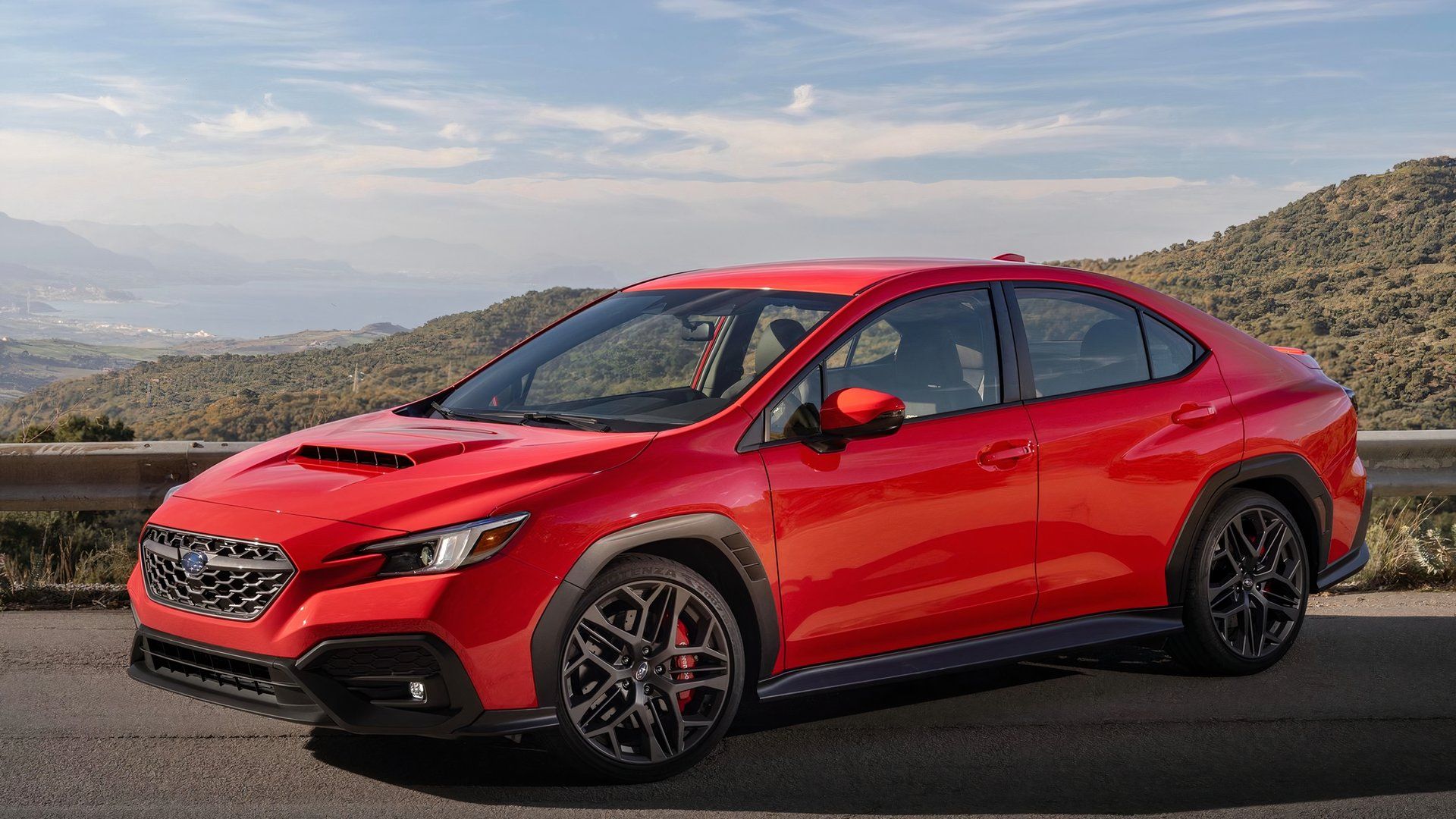 2024 Subaru WRX TR, front quarter view, red