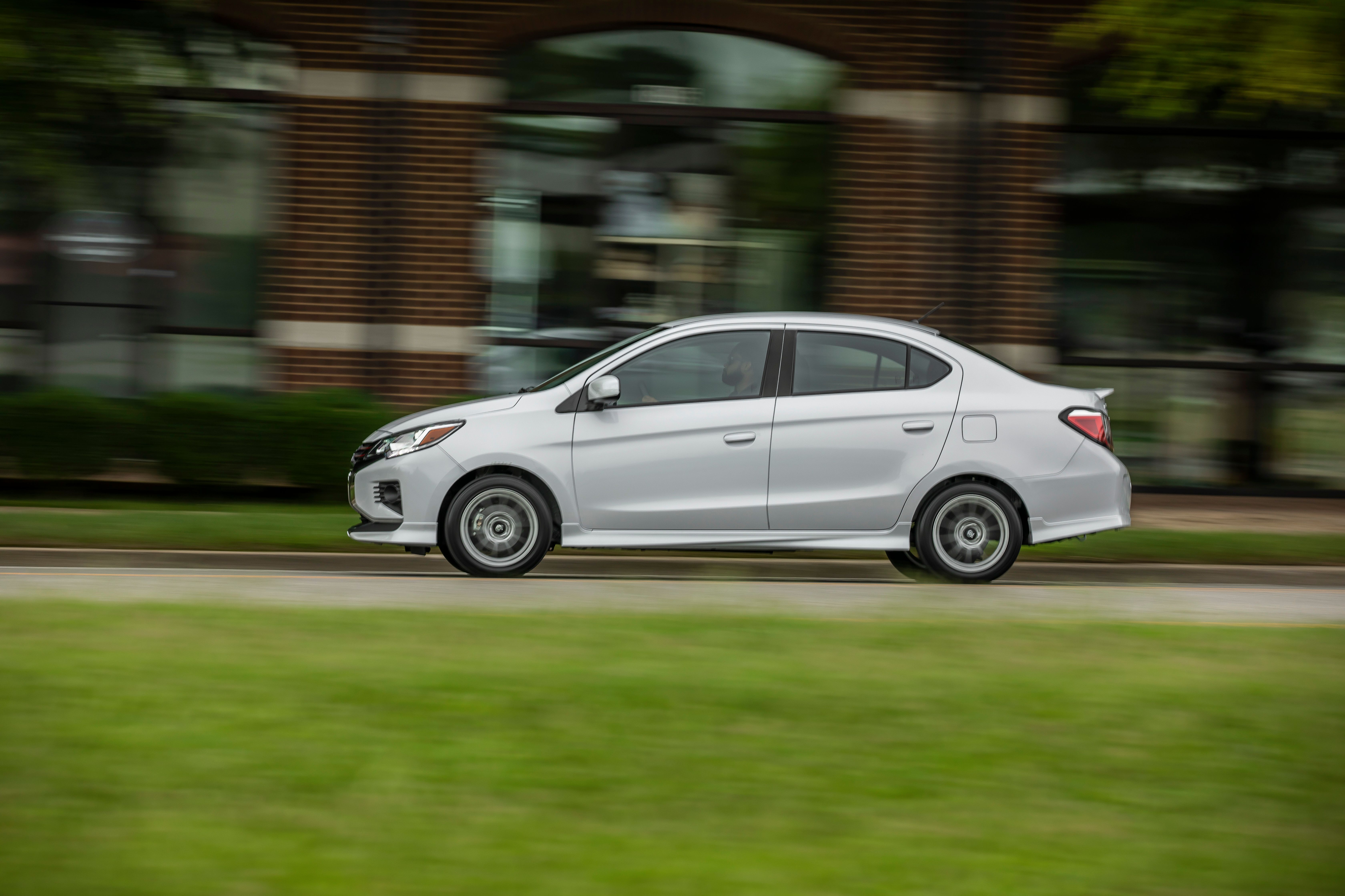 The 2024 Mitsubishi Mirage G4 in profile driving.