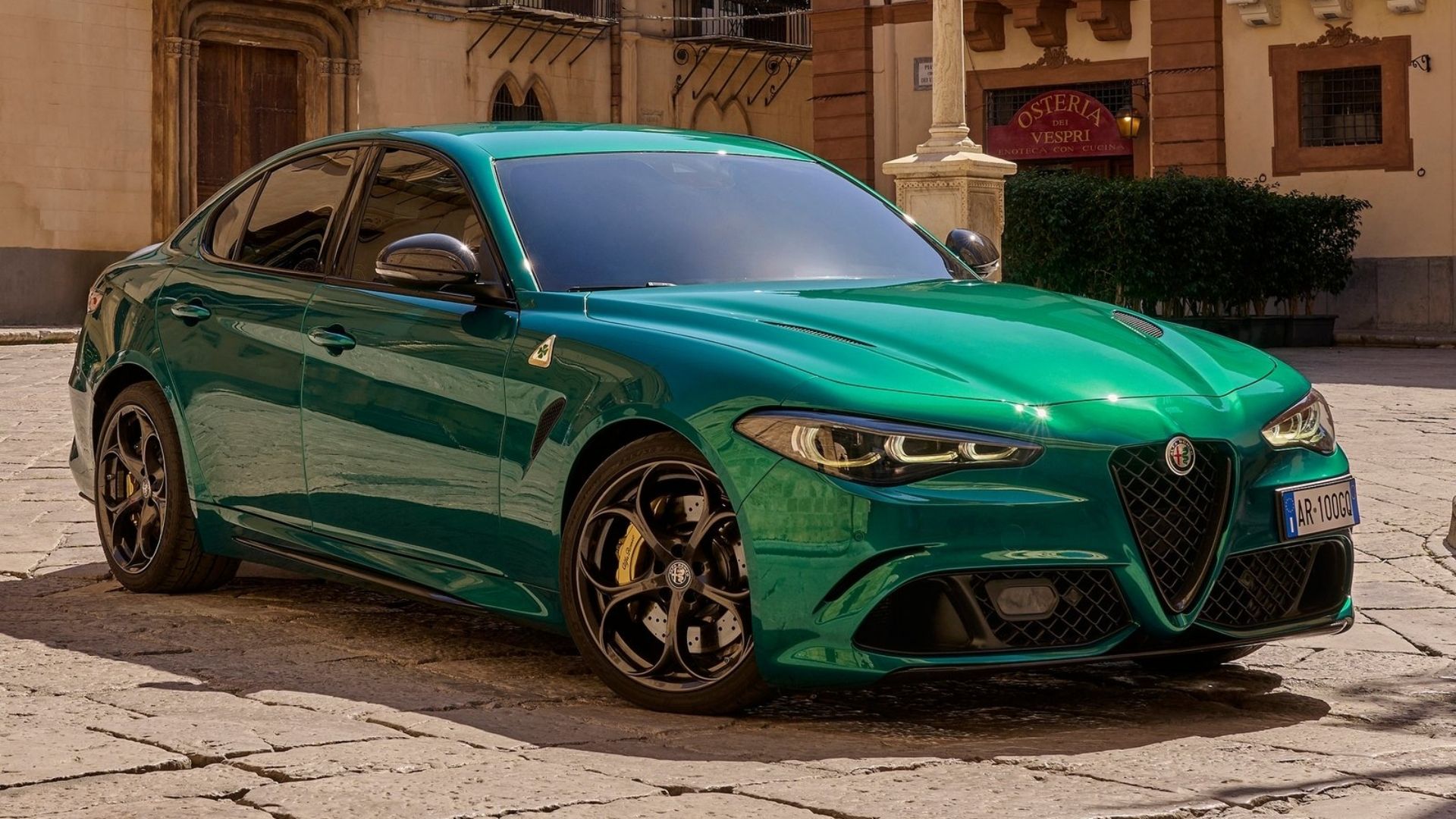 alfa romeo giulia quadrifoglio front quarter green