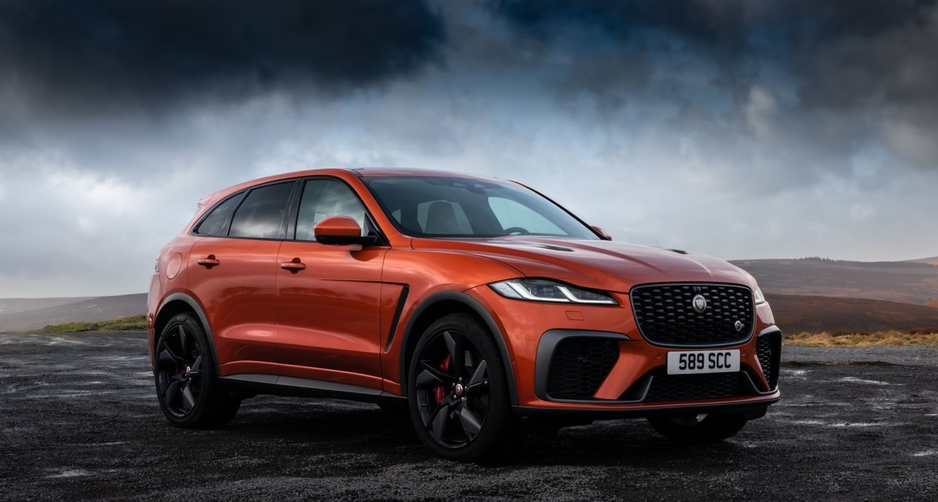 jaguar f-pace svr front quarter orange