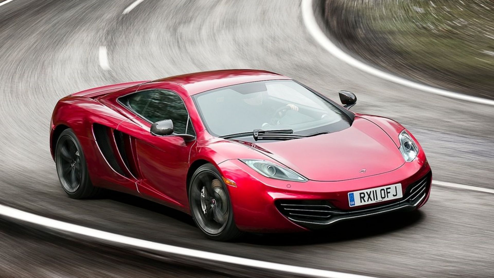 mclaren mp4-12c front quarter red elevated