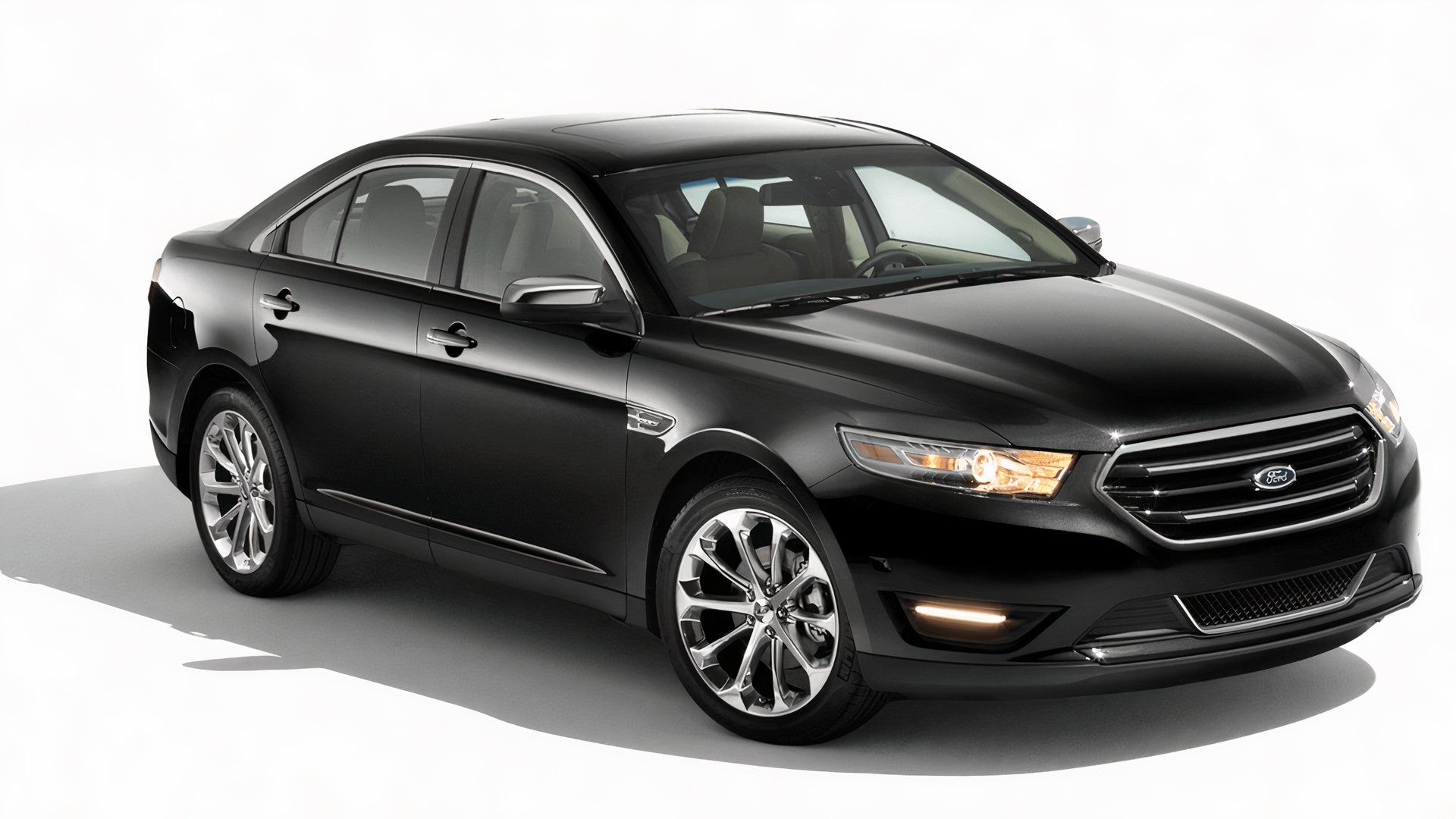 2018 Ford Taurus sedan front and side view, black