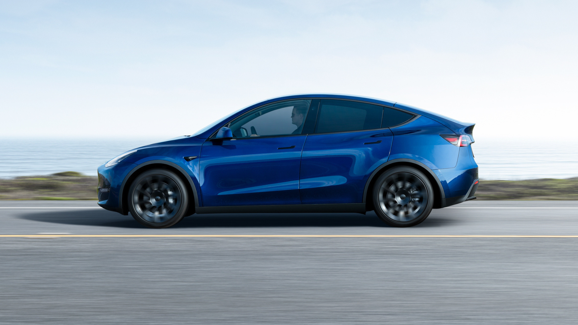 tesla model y side