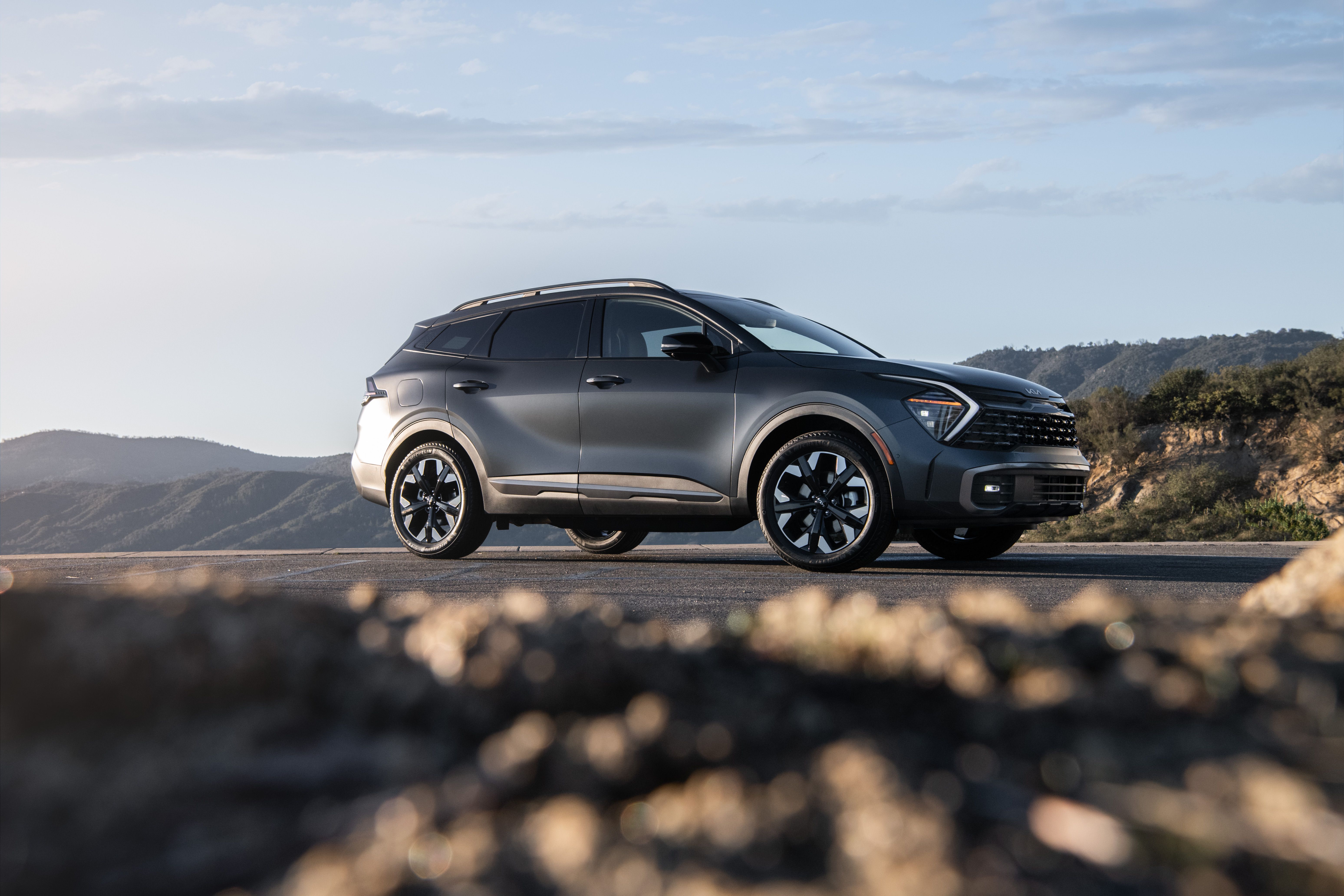 2025 Kia Sportage Plug-In Hybrid parked on road