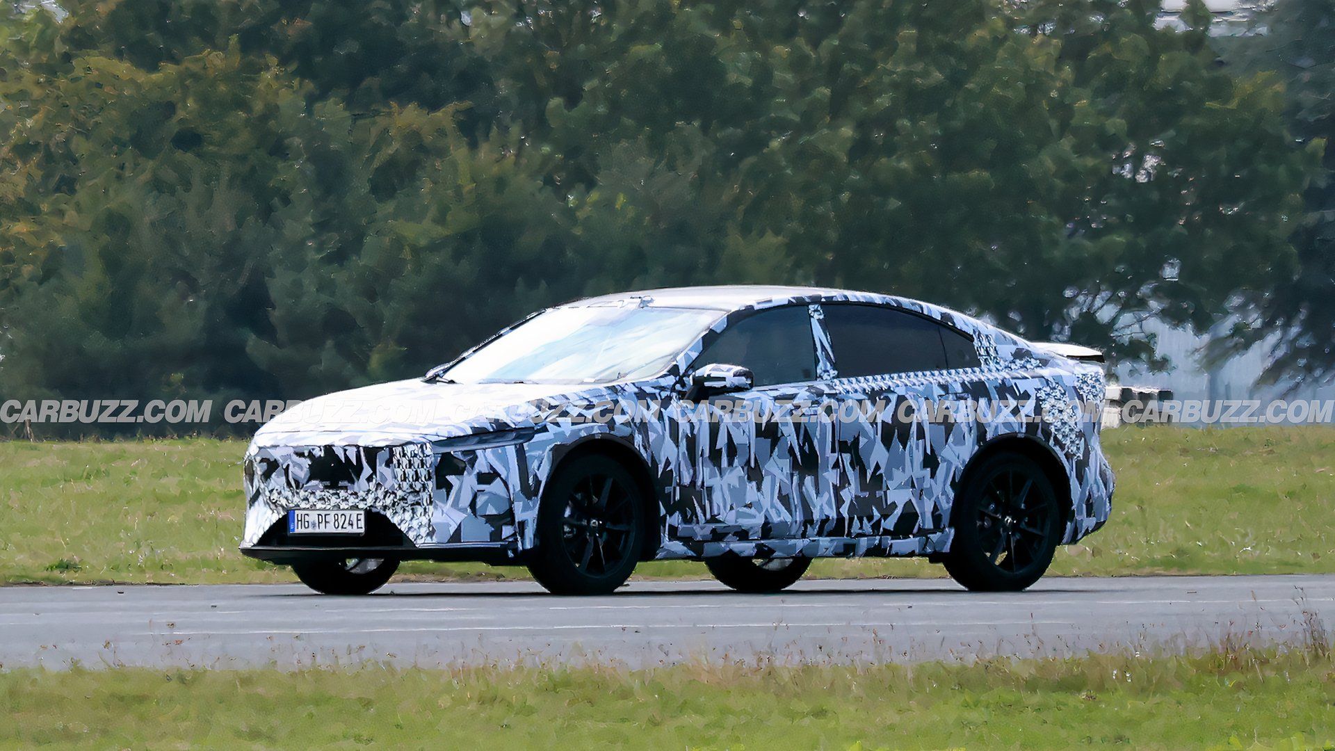Mazda's Sexy New Sedan Raises Its Spoiler For The Camera