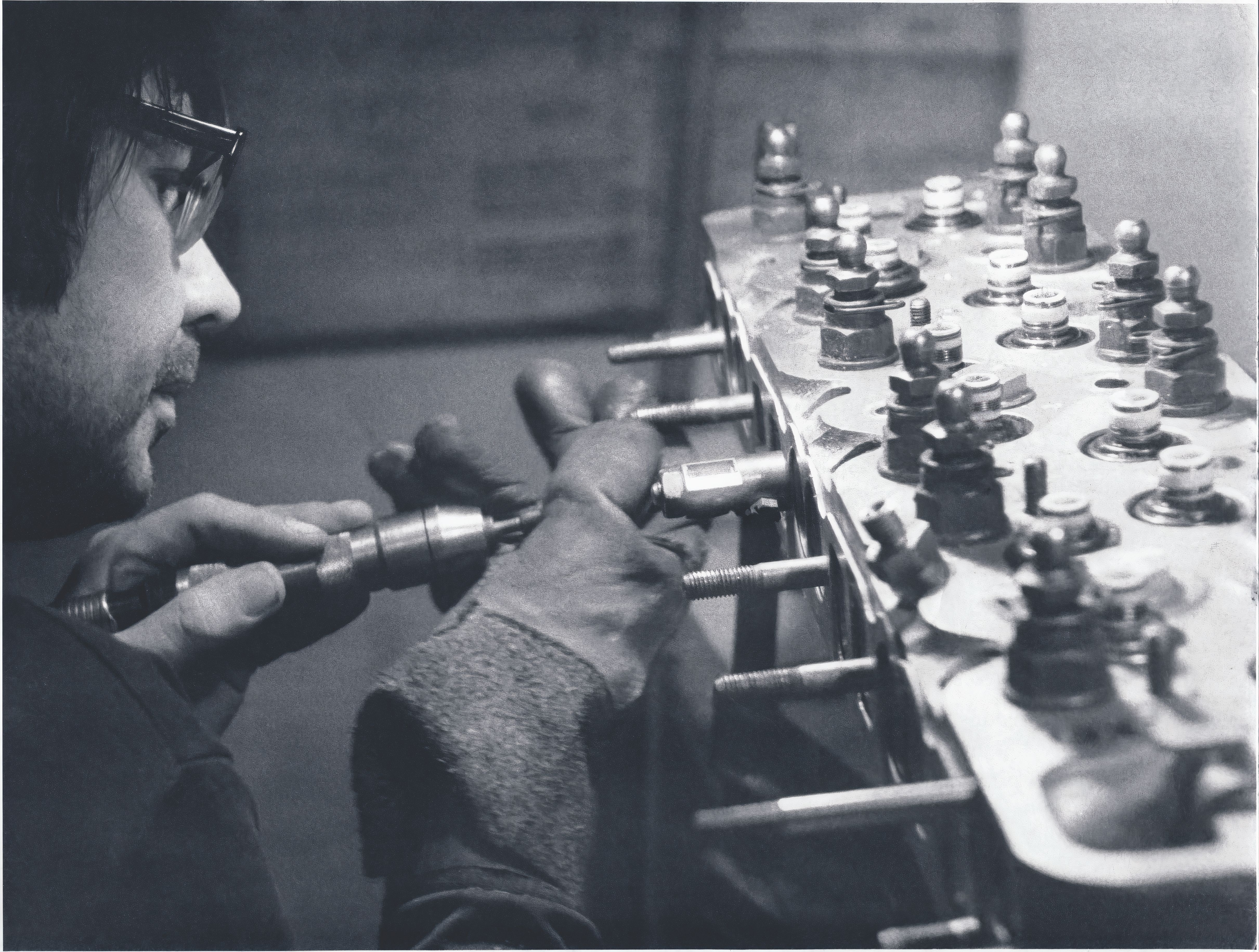 Melcher working on an engine, Black and White