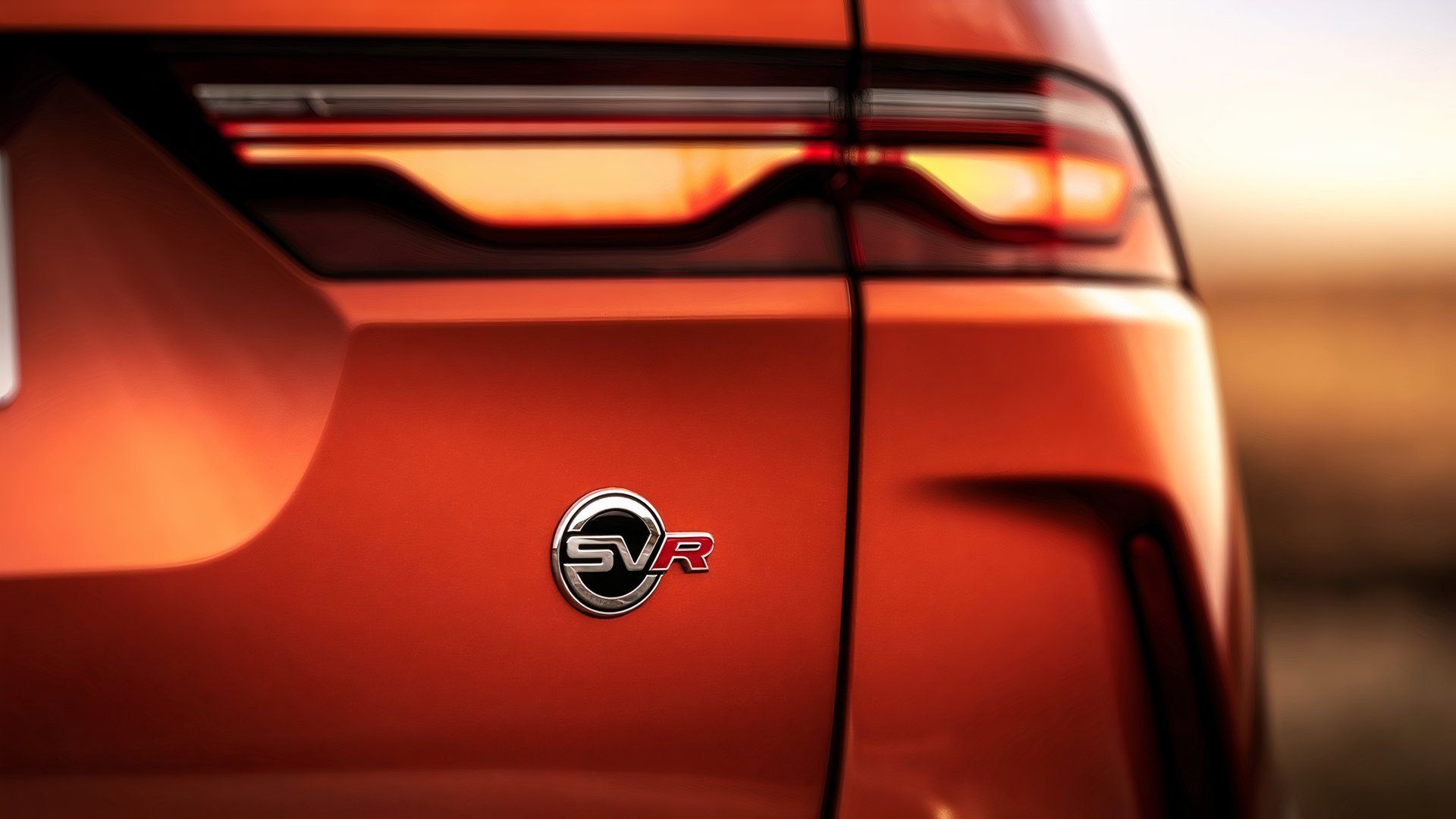 f-pace svr badge orange