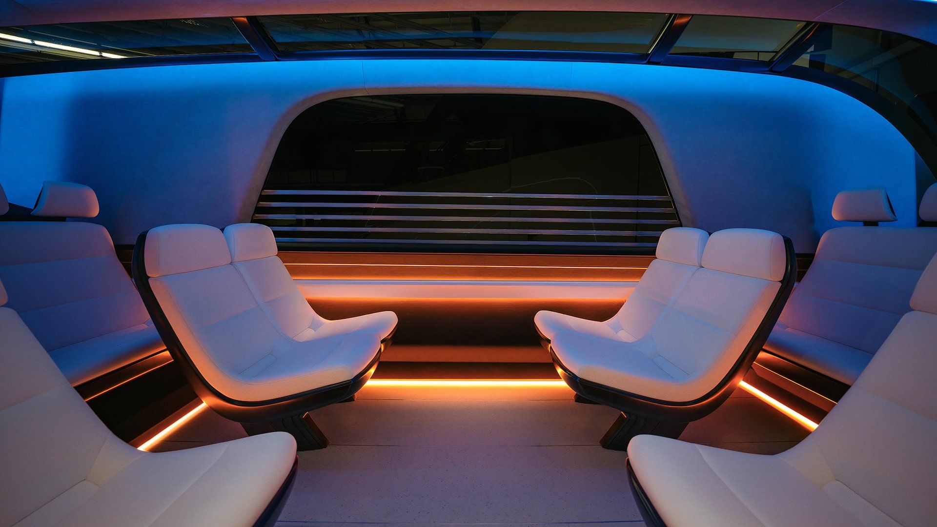 Tesla Robotaxi Revealed With Butterfly Doors And A Matching Robovan