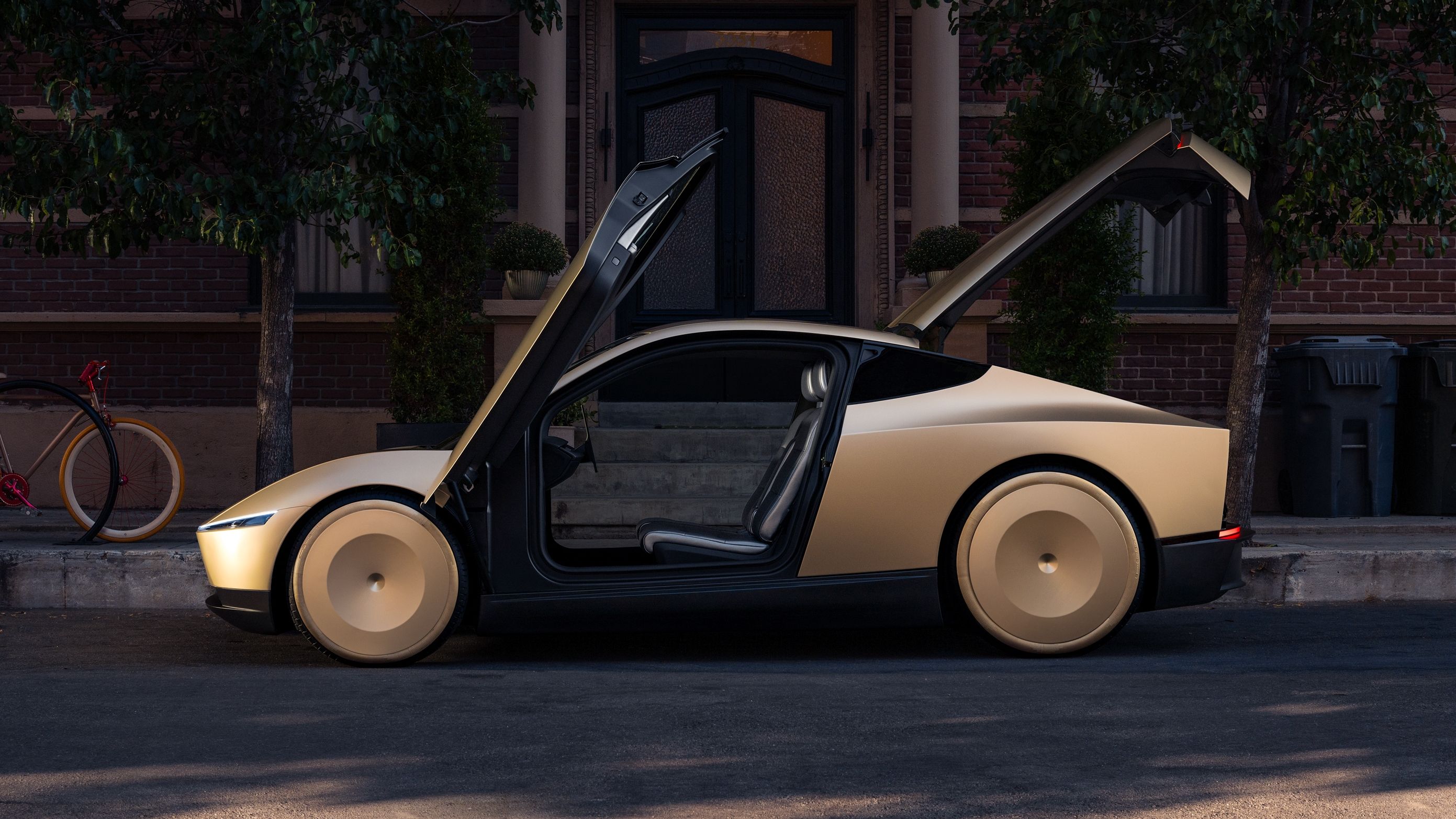 Tesla Robotaxi Revealed With Butterfly Doors And A Matching Robovan