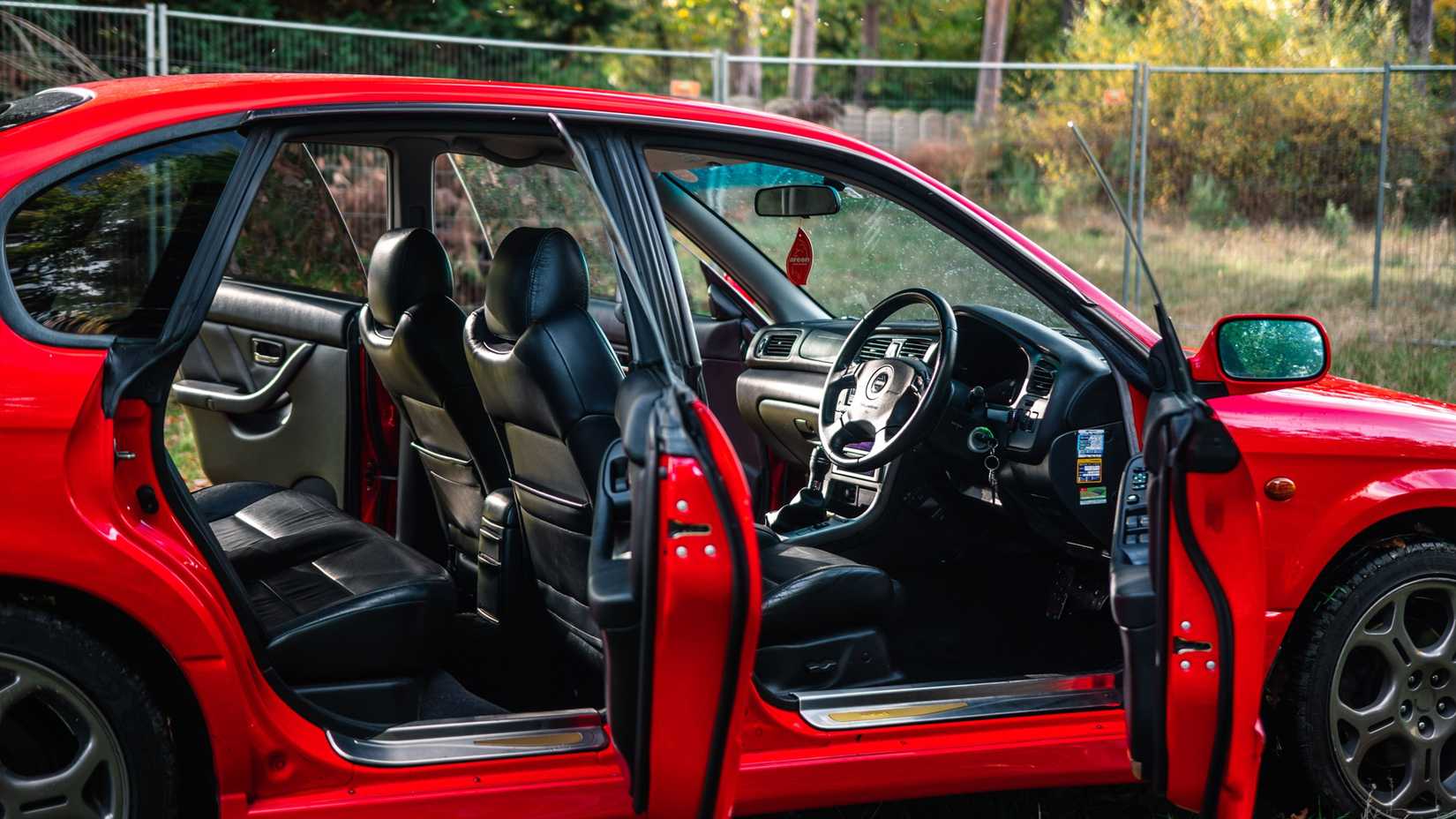 2000 Subaru Legacy B4 Blitzen Red Doors Open Interior Side View