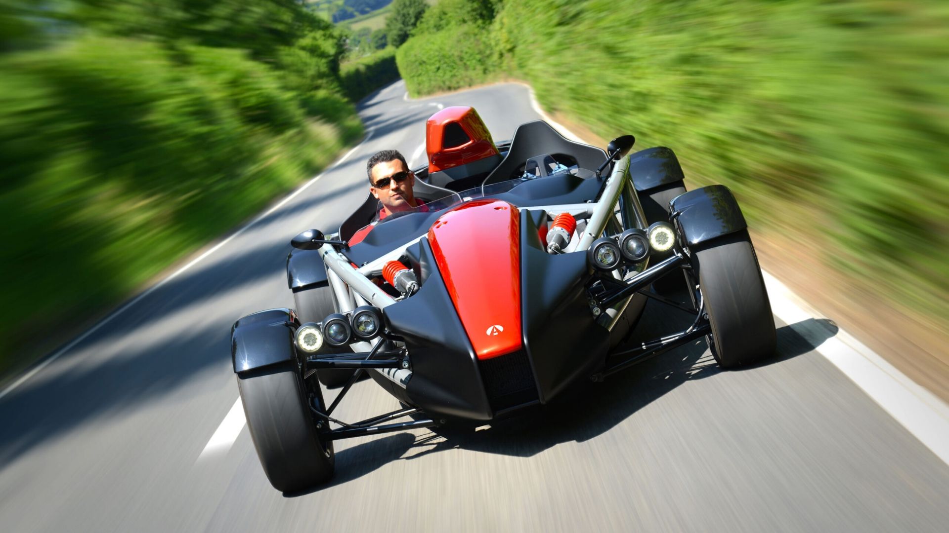 Front view of the Ariel Atom 4 while driving