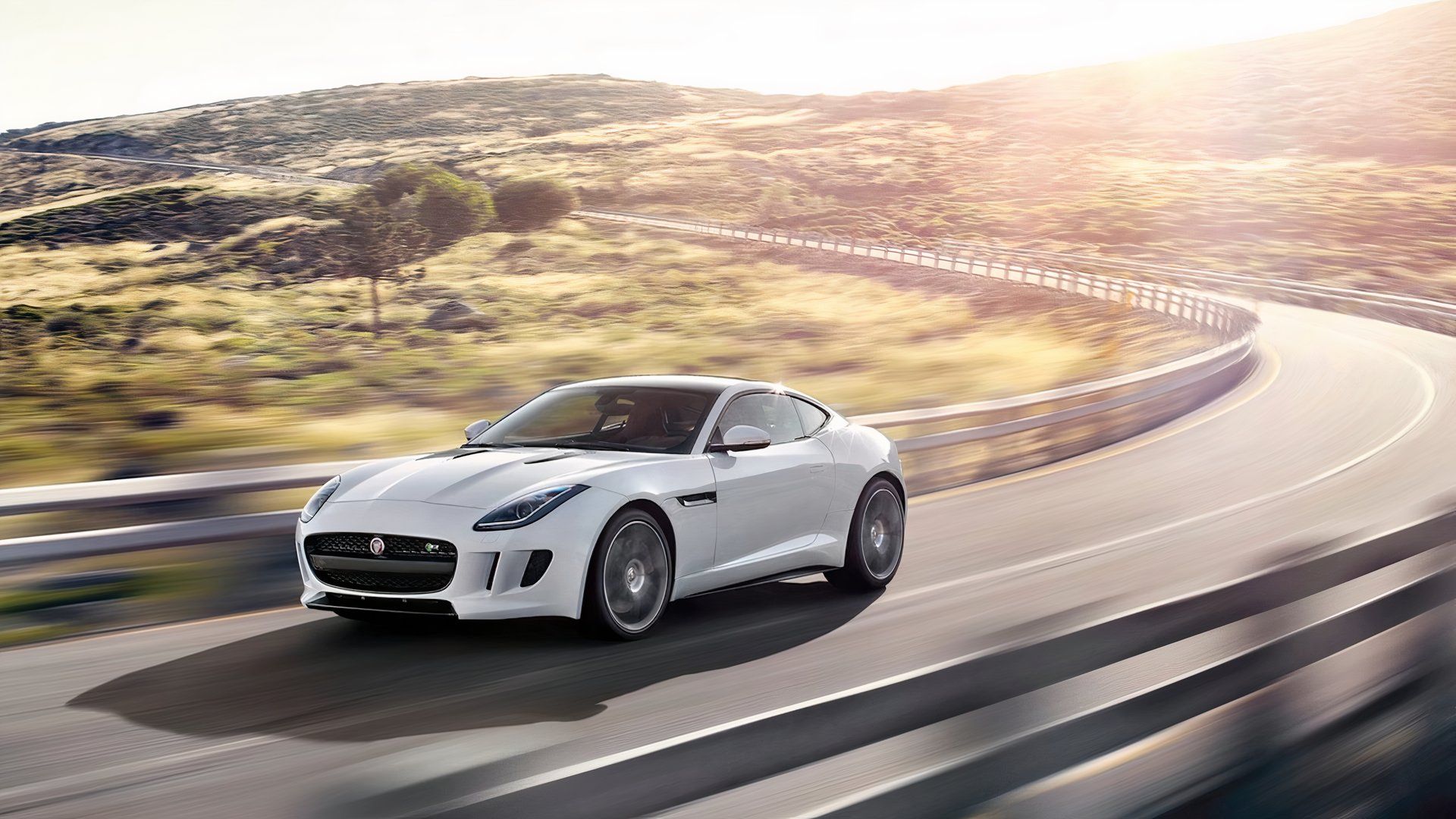 2015 Jaguar F-Type R Coupe White Front Angle Driving