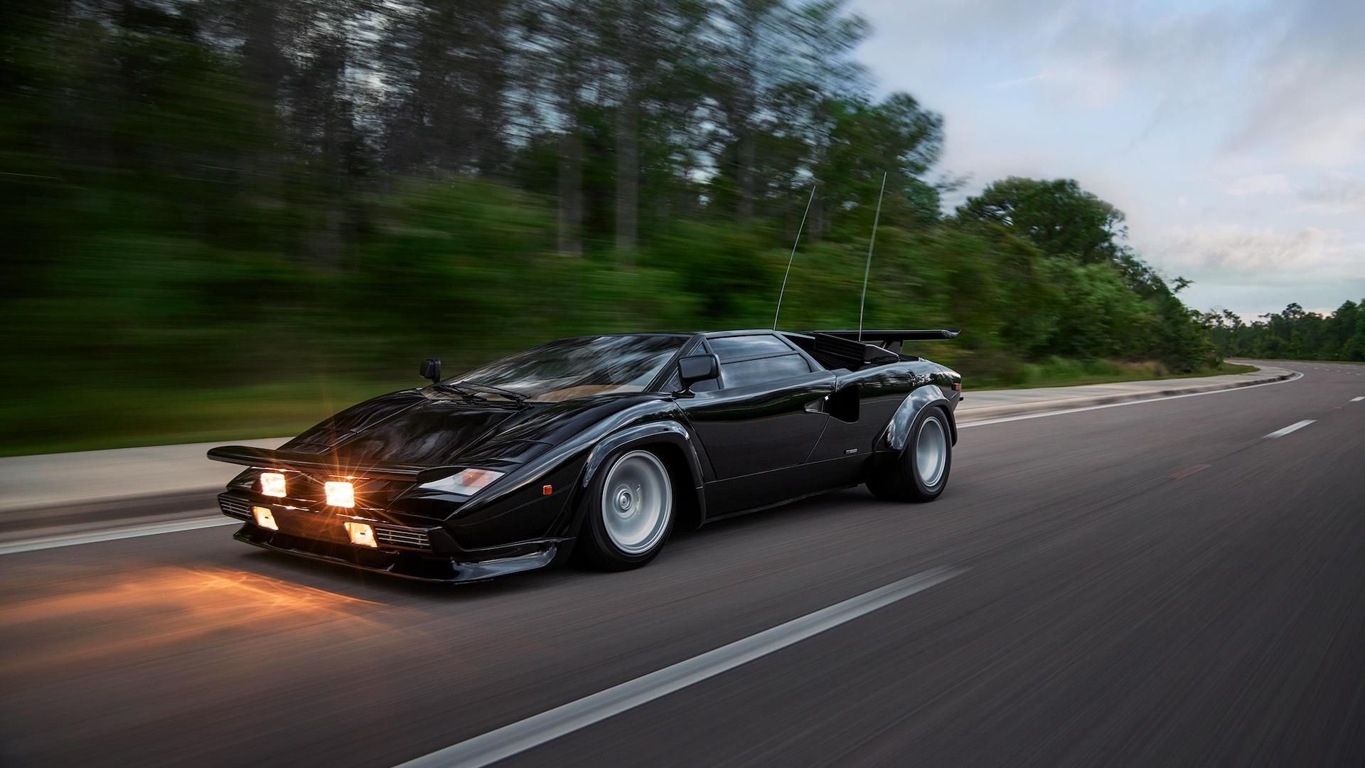 1985 Lamborghini Countach QV Black Lights On Front Angle Driving