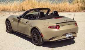 2024 Mazda MX-5 Miata Roof Down Gold Rear Angle
