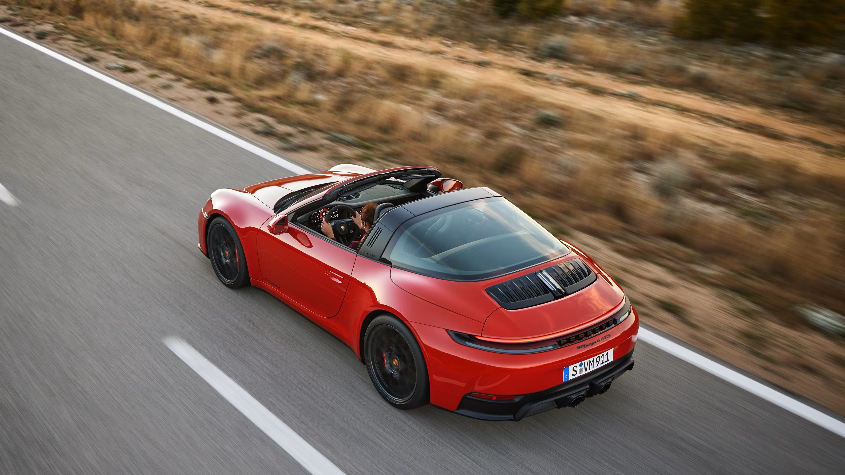 2025 Porsche 911 Targa GTS T-Hybrid Red Rear High Angle Driving