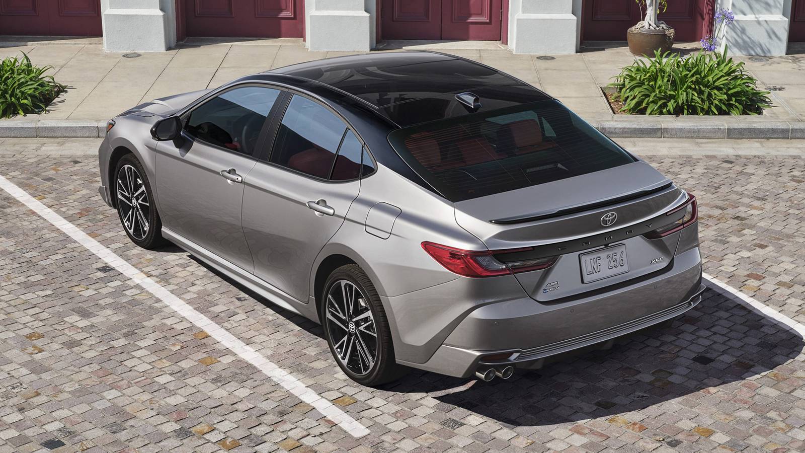 A modern 2025 compact sedan illustrating an efficient ride-share friendly profile