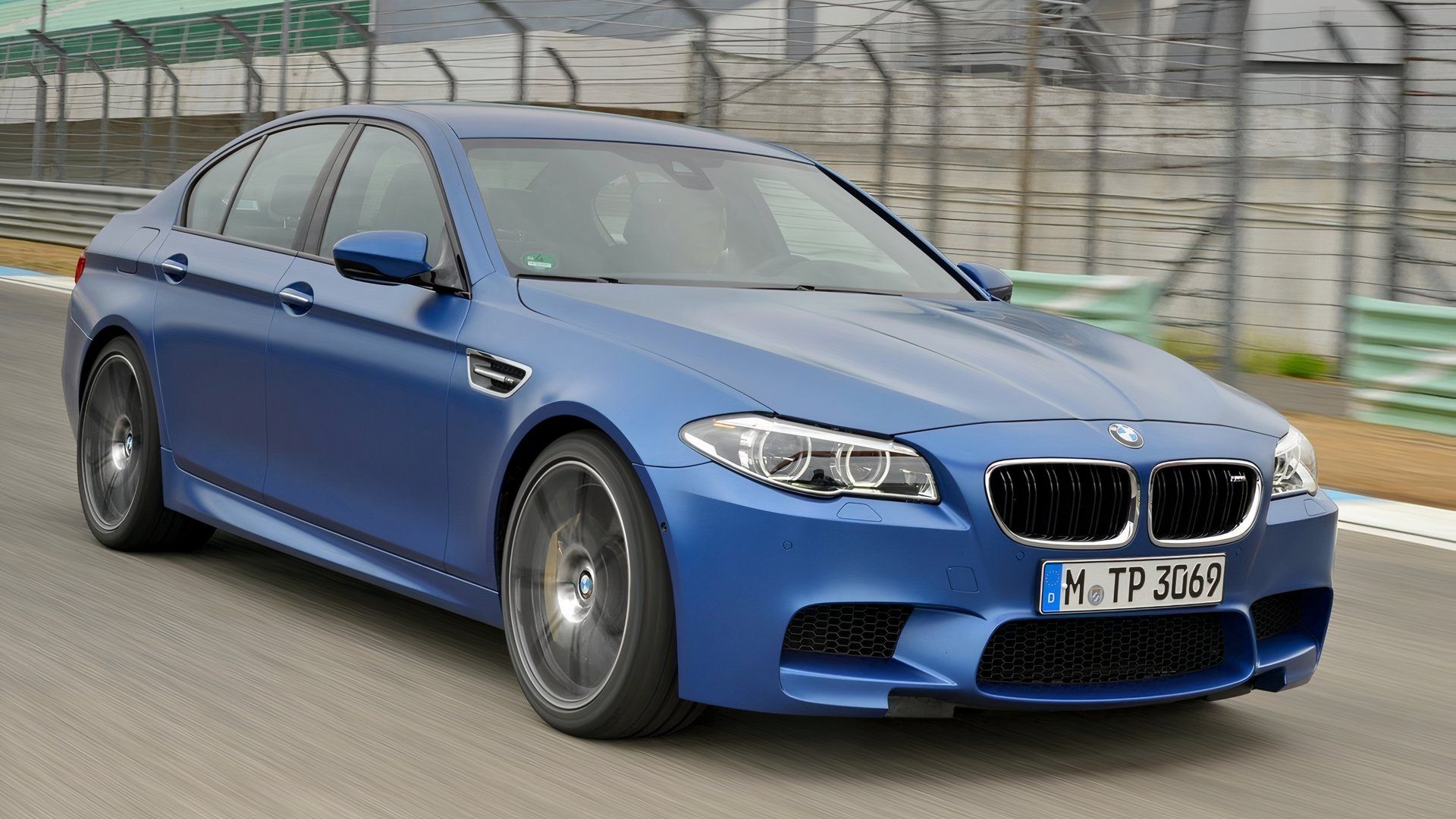 2014 BMW M5 F10 Blue Front Angle Driving
