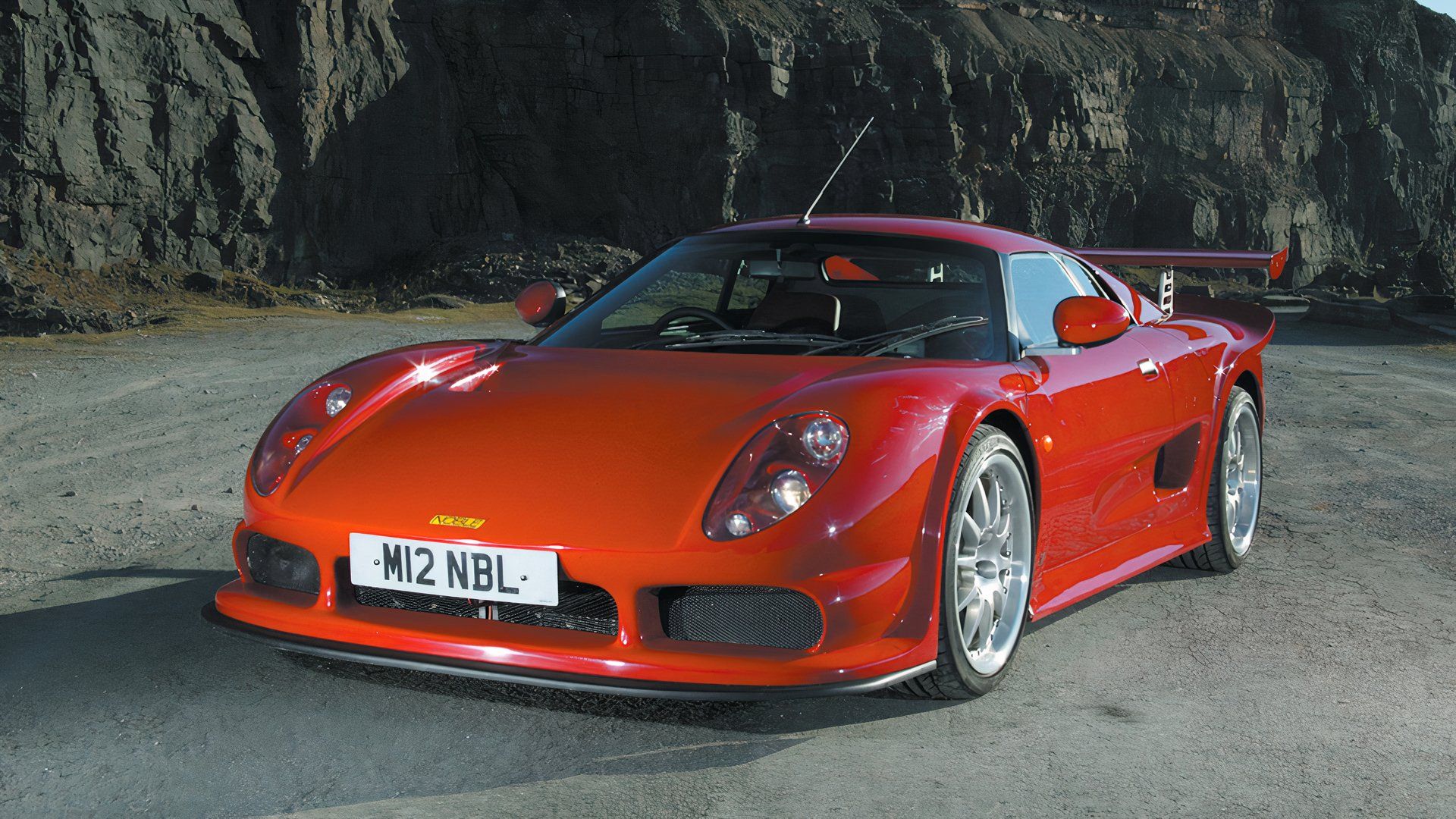 10 Sports And Luxury Cars That Share Parts With Cheap Everyday Cars