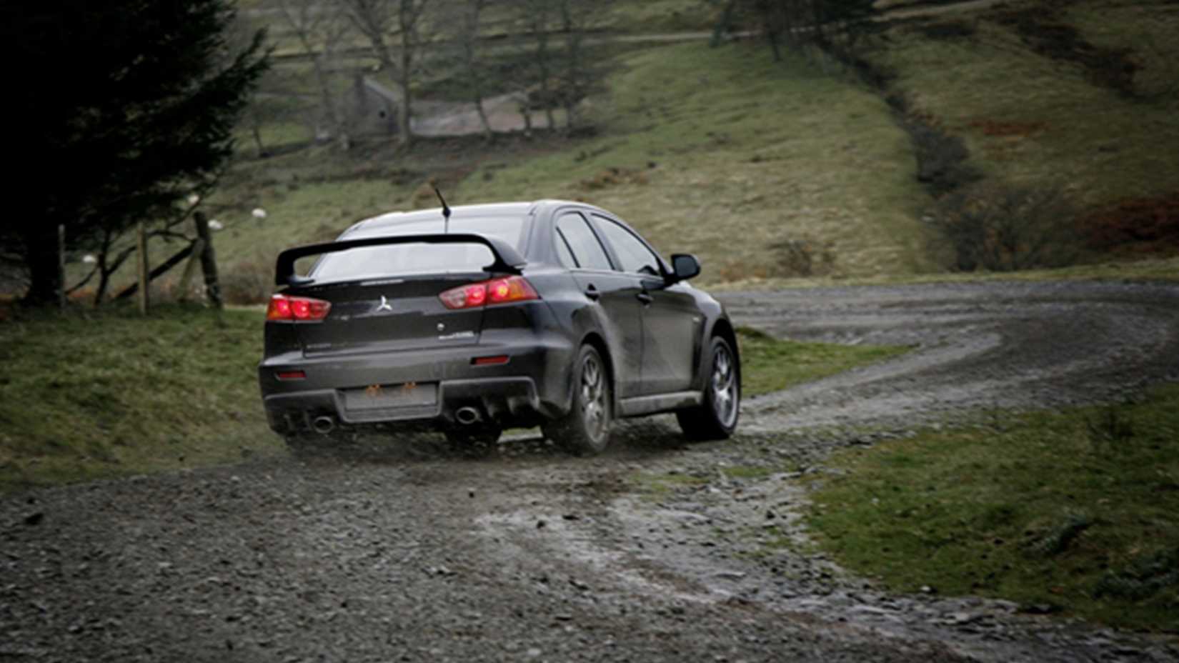 2008 Mitsubishi Lancer Evo X Black Rear Angle Mud Drifting