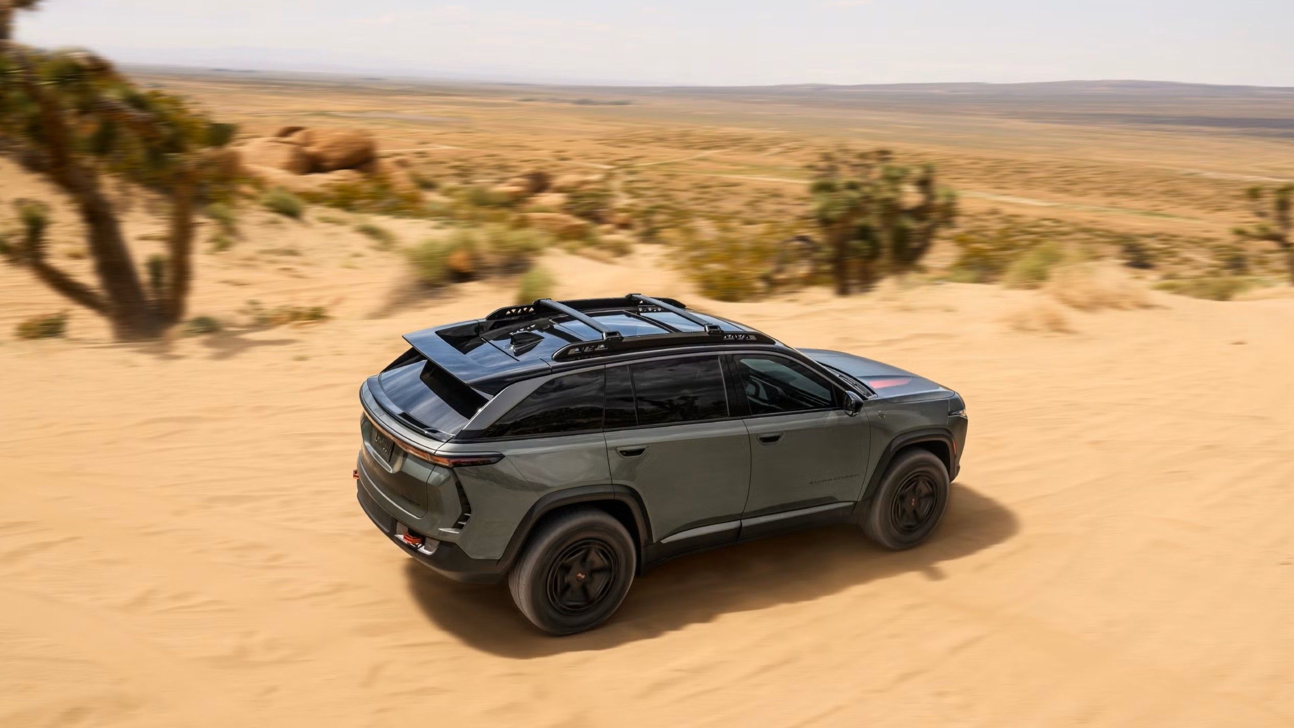 Jeep Wagoneer S Trailhawk Concept Gray Rear Angle Desert Driving