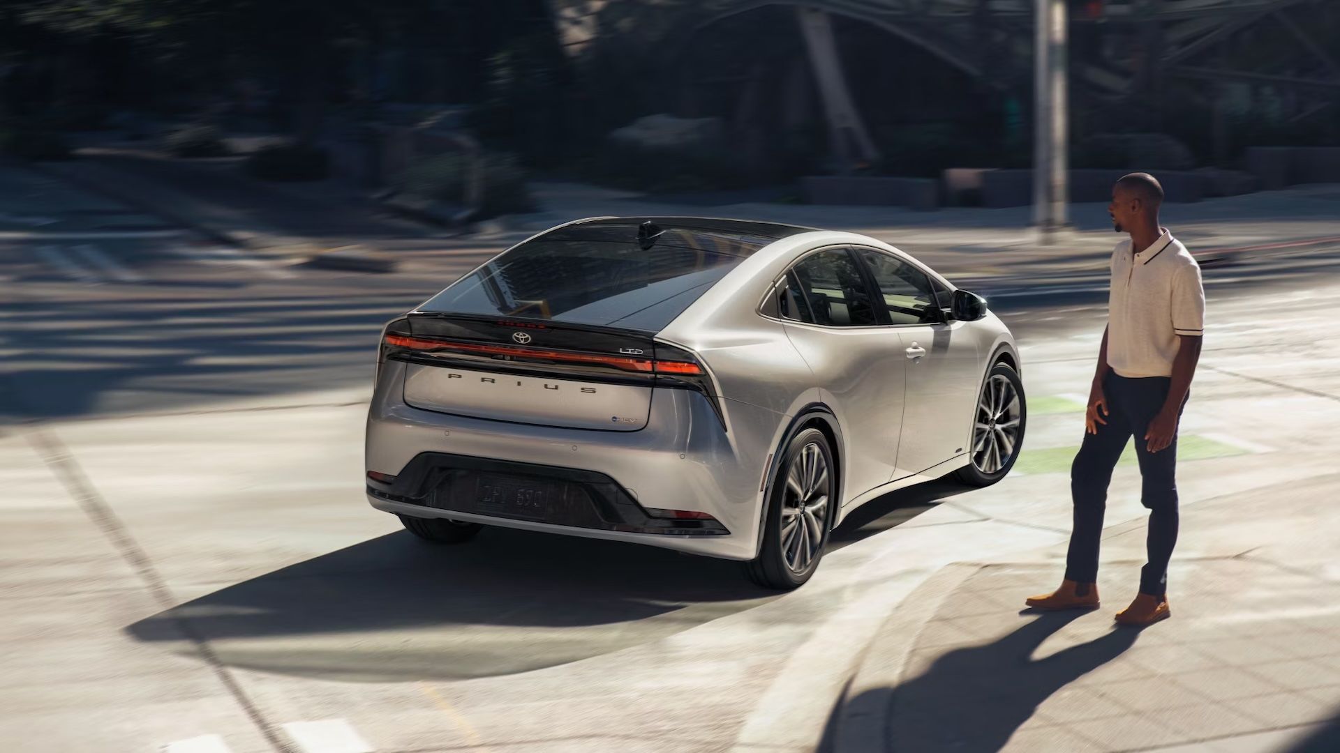 2025 Toyota Prius Silver High Rear Angled View