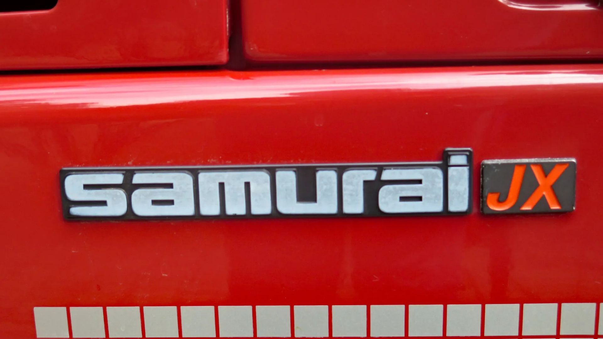 Suzuki Samurai Jimny Sierra Front Emblem Badge - Black/Silver (295mm X 32mm) SJ40/41/413