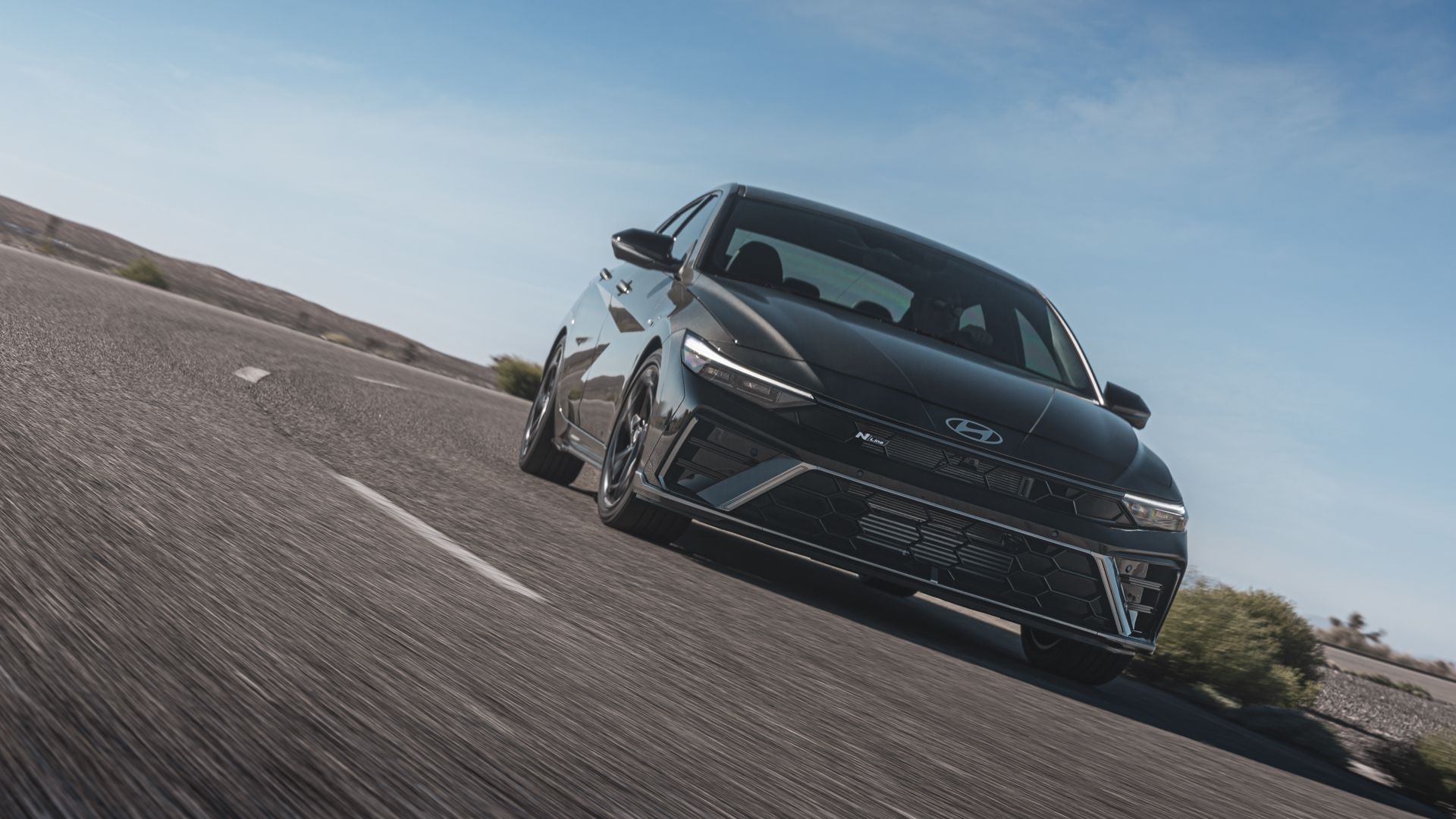 2024 Hyundai Elantra N Line front diving into corner