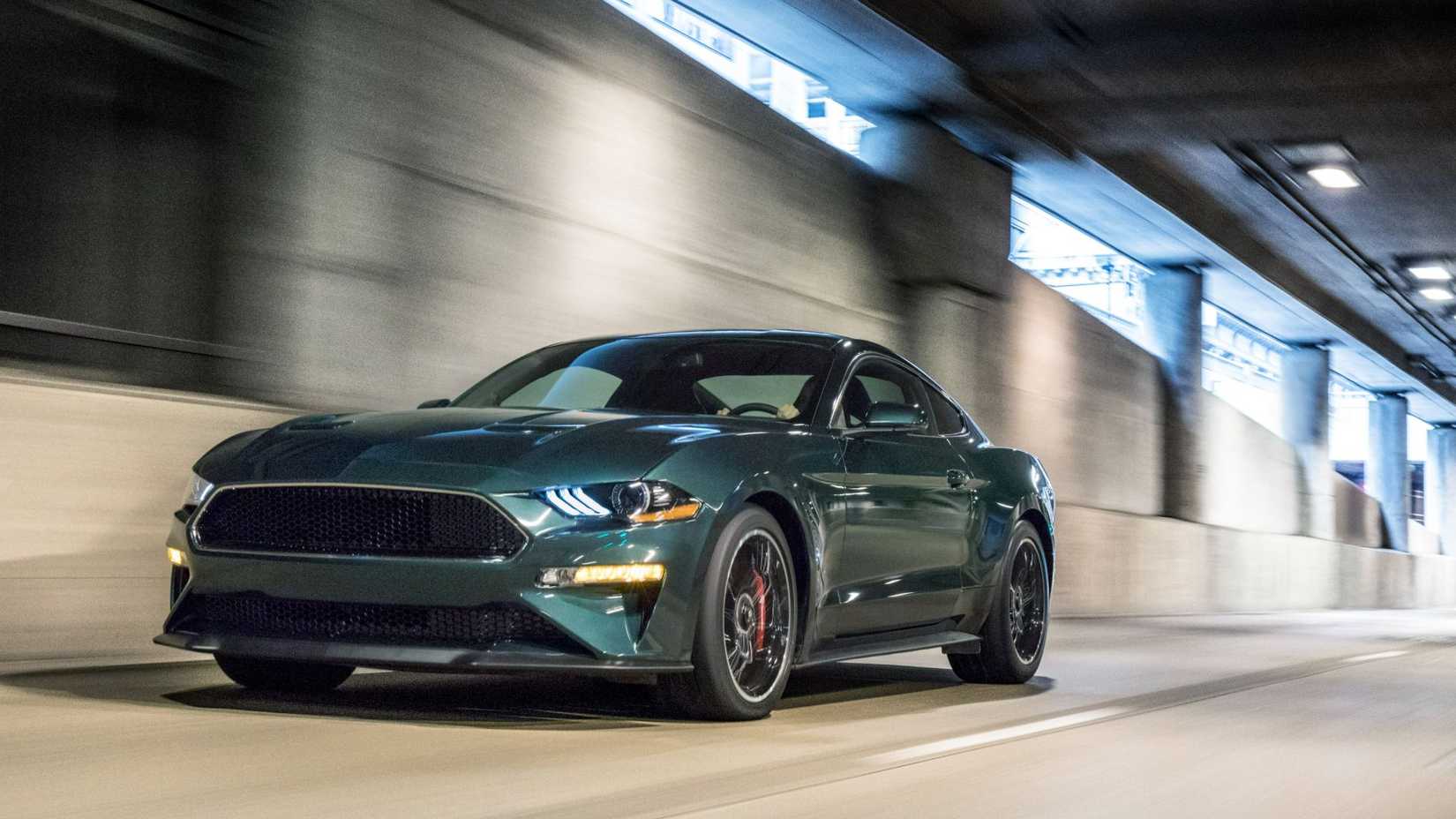 2020 Ford Mustang Bullitt Highland Green Front Angled View Driving