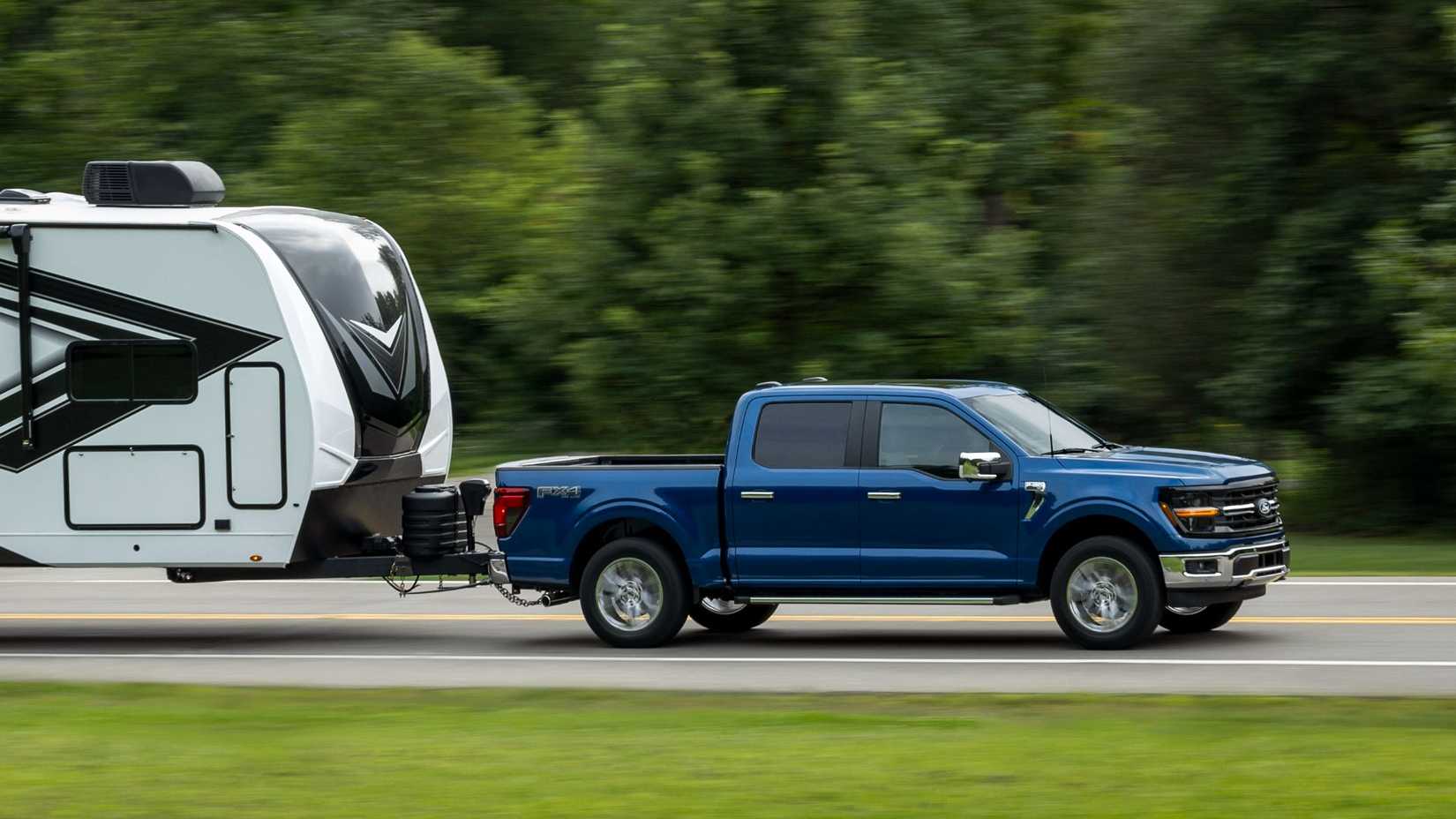 2025 Ford F-150 XLT Crew Cab 4x4 Blue Side View Towing