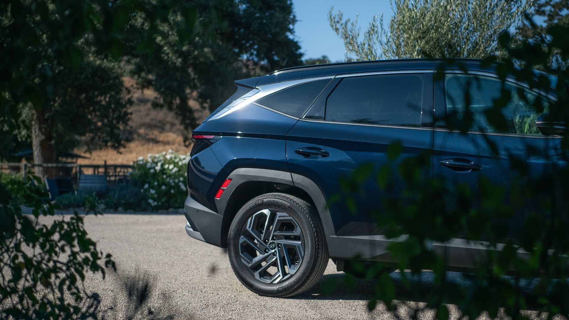 2022 - 2025 Hyundai Tucson Hybrid 4th Gen (NX4) Rear-End Side View