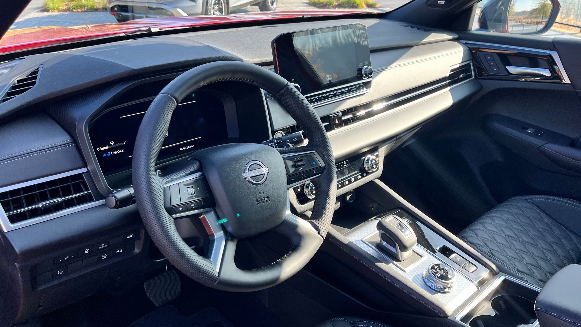 Interior photo of the 2026 Nissan Rogue Plug-In Hybrid showing spacious third-row seating and modern infotainment