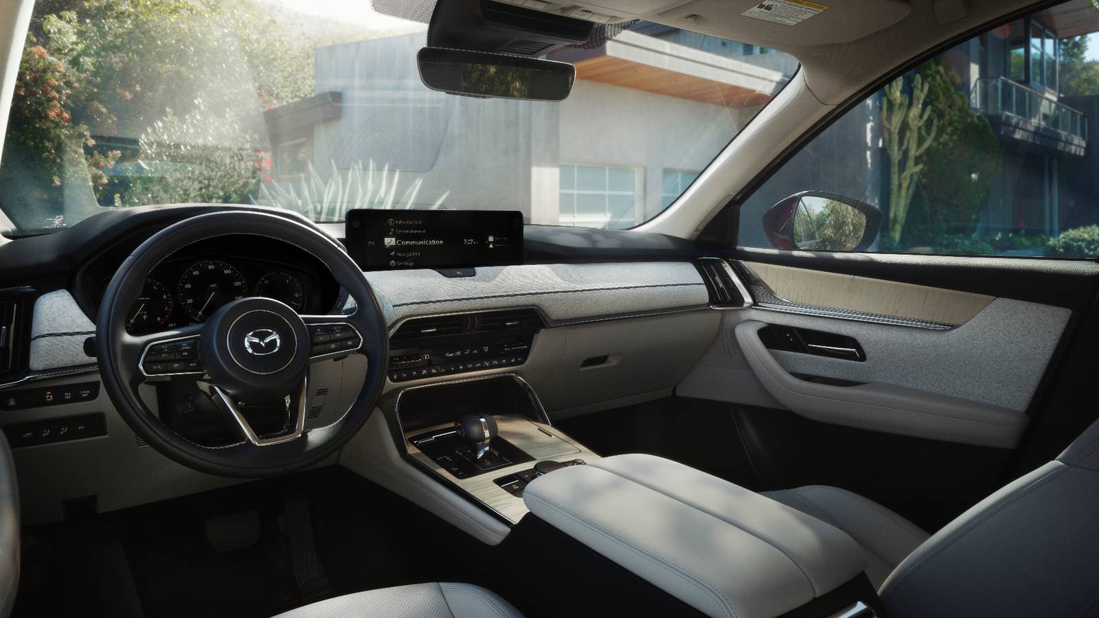 2026 Mazda CX-90 interior with Nappa leather, maple wood trim and a driver-focused dashboard