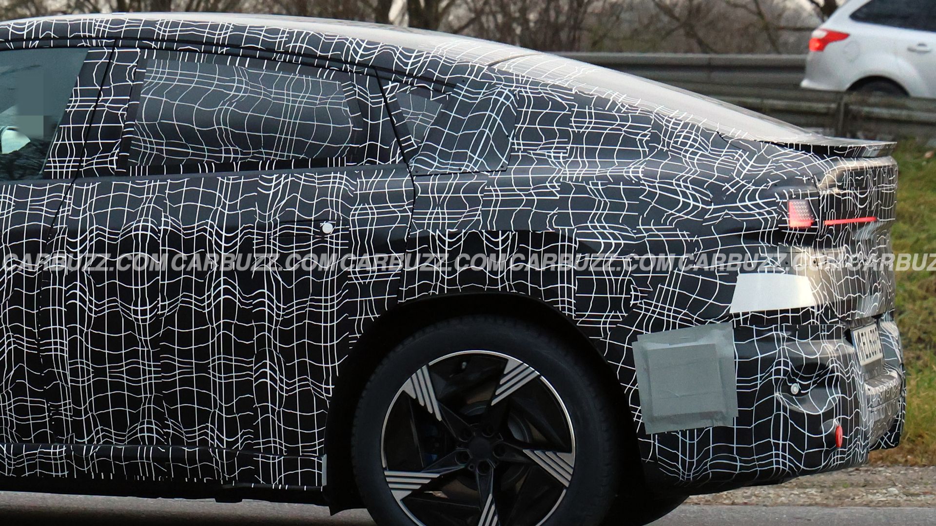 BMW iX4 Electric Sports Activity Coupe Spied Testing On The Road