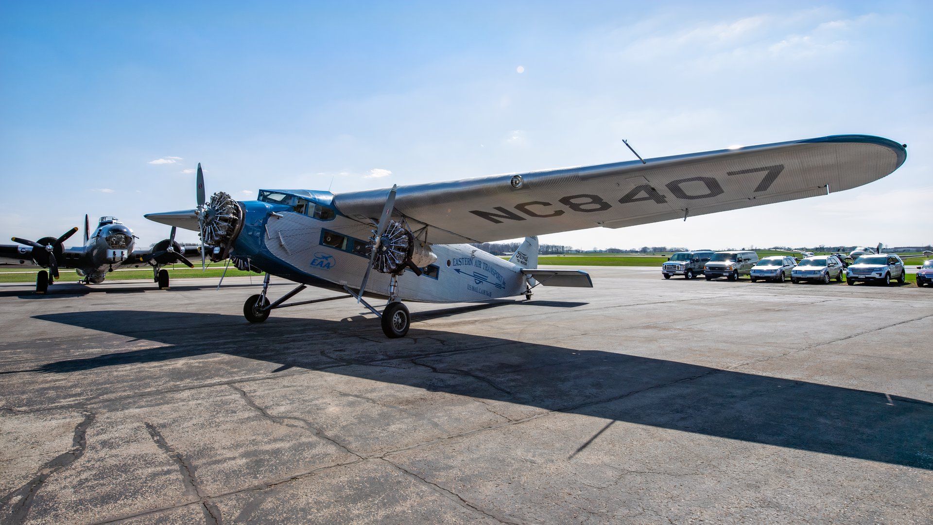 1920s Ford Dominated Land With The Model T And Sky With The Tri-Motor