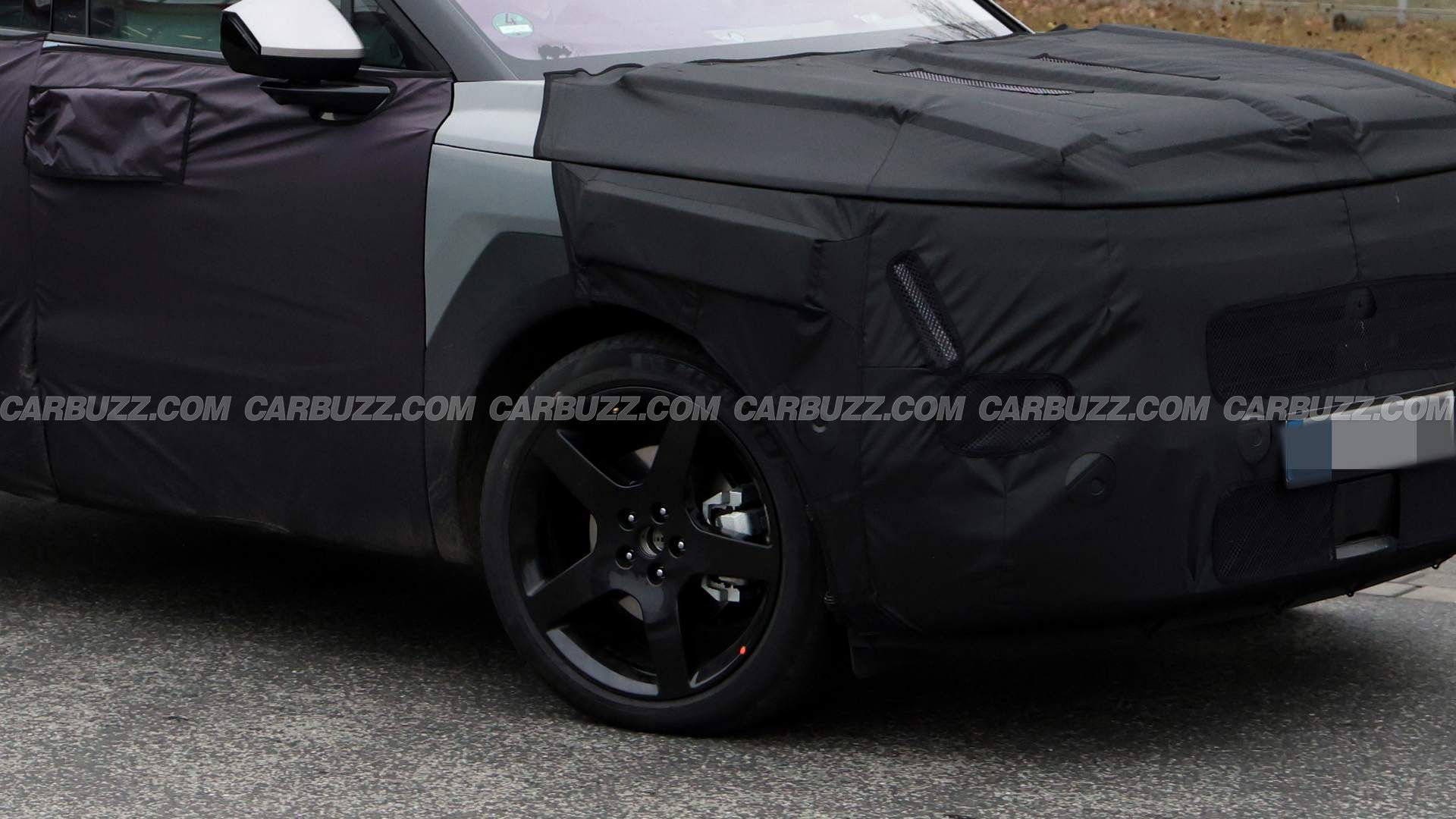 Next-Gen Hyundai Tucson Spied Hiding Boxy New Shape Under Heavy Camouflage