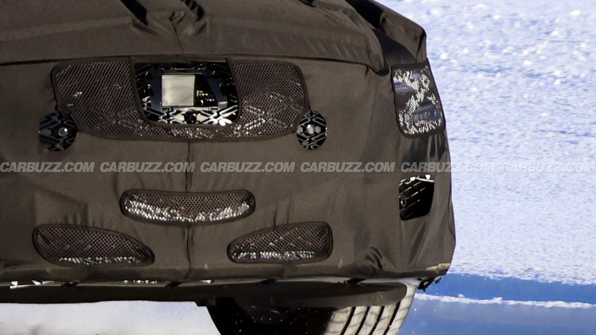 New Genesis G80 Spied Hiding Hybrid Powertrain Under Heavy Camo