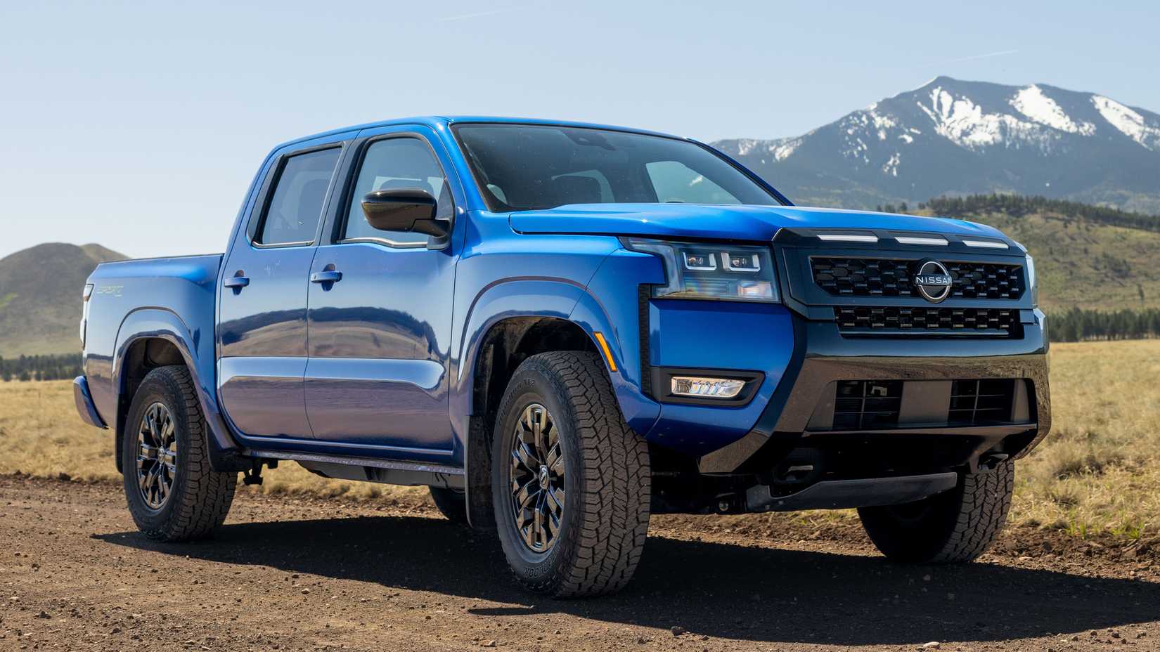 2027 Nissan Frontier Sport front three-quarter