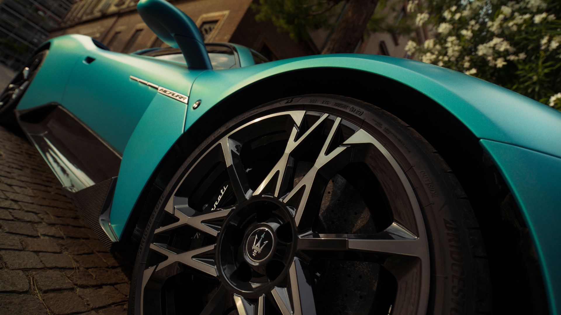 Rear three-quarter — twin-turbo Nettuno V6 mid-mounted
