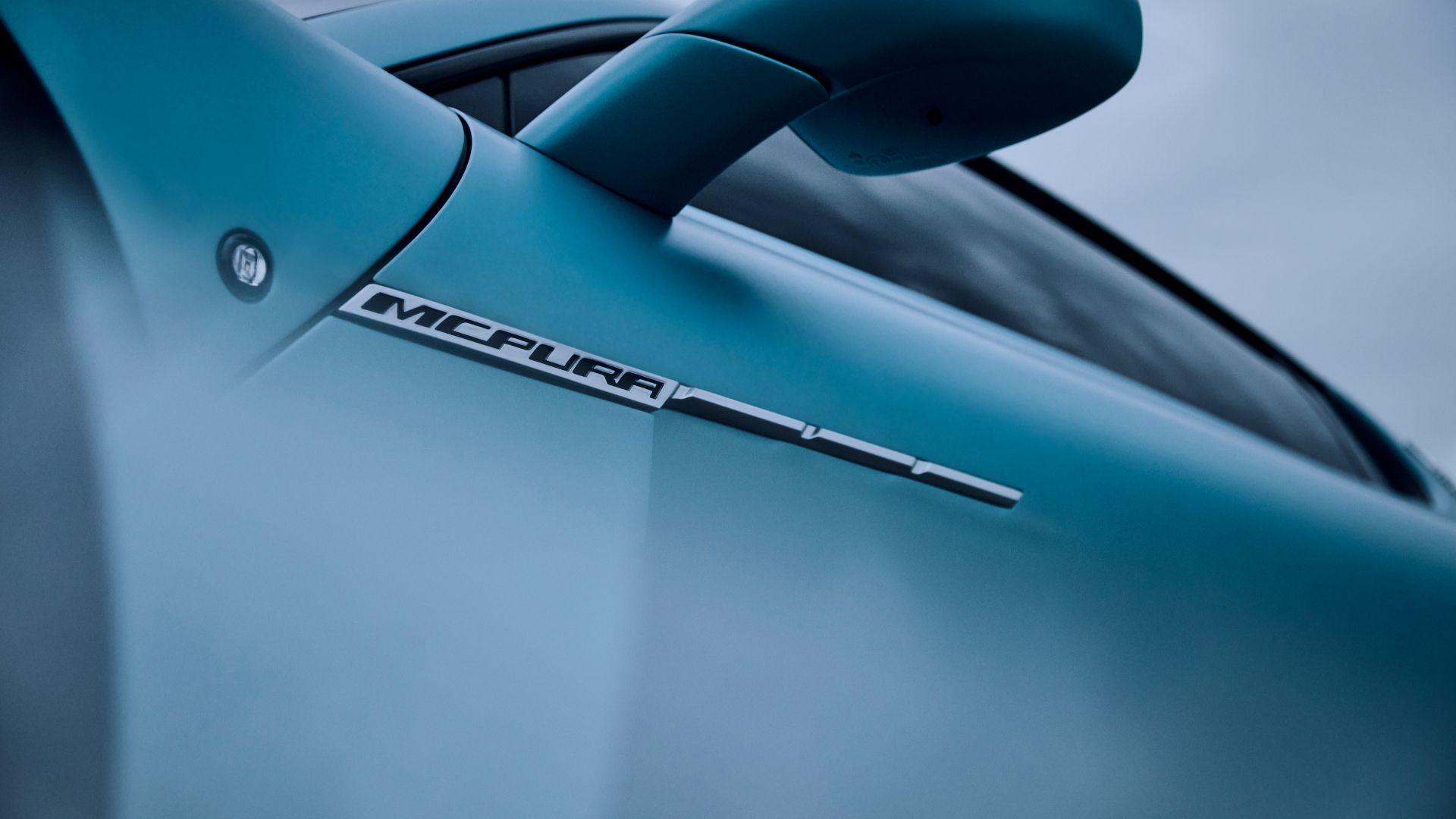 2026 Maserati MCPura coupe in AI Aqua Rainbow — exterior three-quarter view
