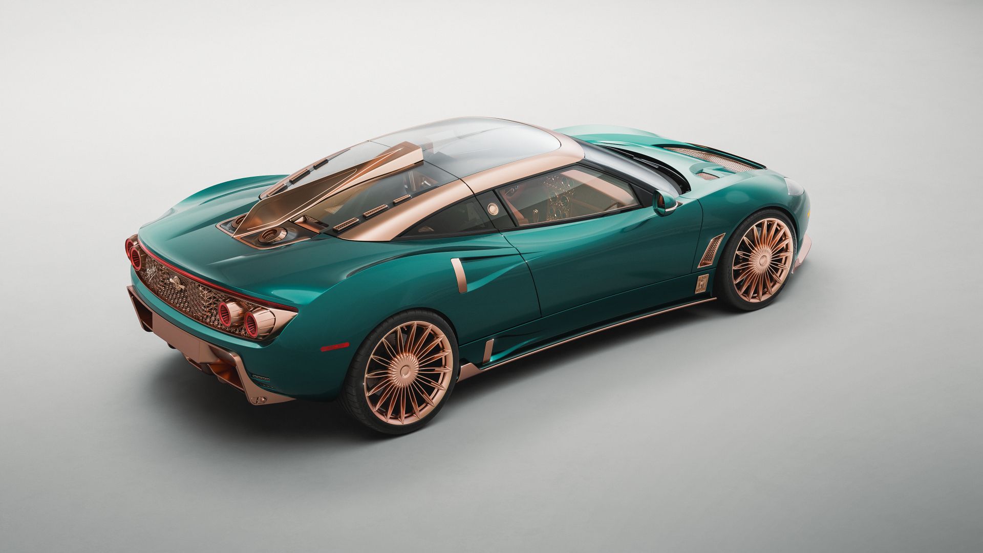 Spyker C8 Preliator XXV three-quarter rear view showing jet afterburner taillights and tail fin