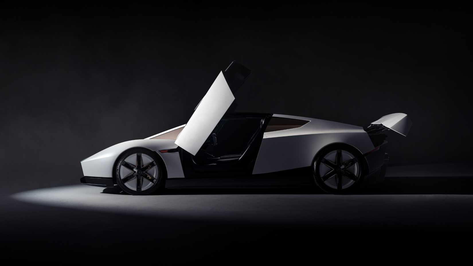 Fighter Rear Engine Glow 2028 Tesla Roadster Gallery: See Tesla's 'Flying Car' From Every Angle