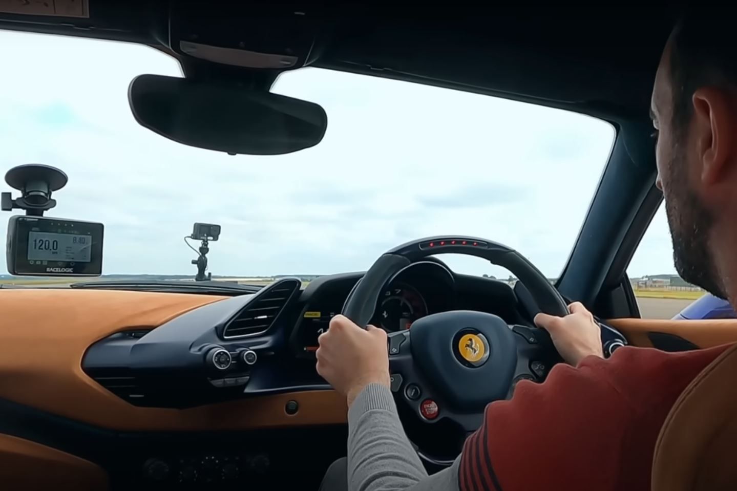 Ferrari Launch Control Can't Beat A Professional Driver's Reactions