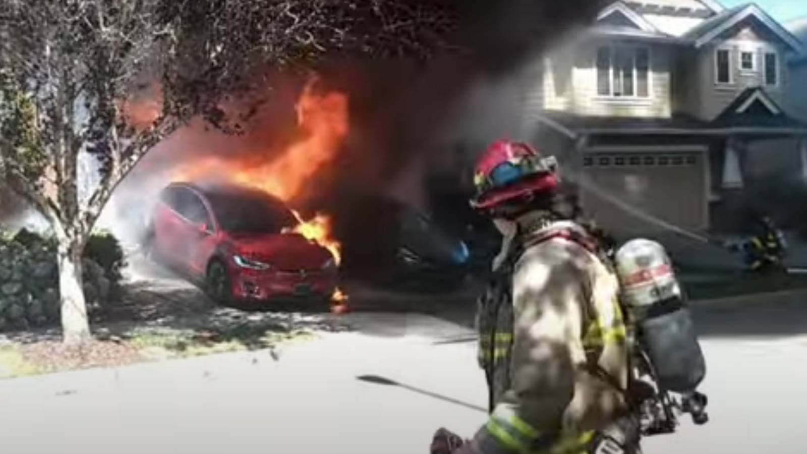 Tesla Fire Animation Watch Two Teslas Catch Fire And Set Off Garage Full Of Ammo